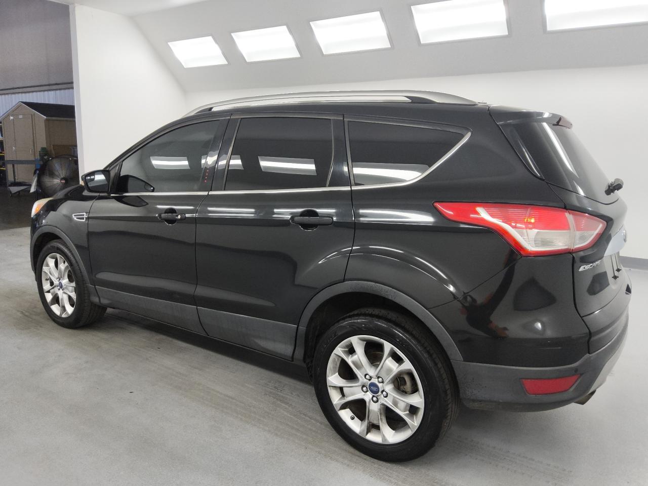 2014 Ford Escape Titanium Black vin: 1FMCU9J93EUA07796 Damage: Left Rear Wheel, Chipped, 4