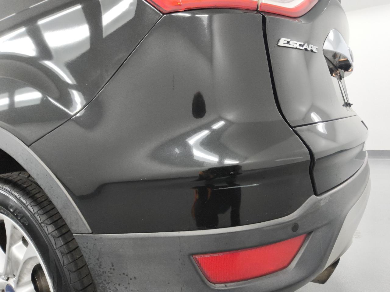 2014 Ford Escape Titanium Black vin: 1FMCU9J93EUA07796 Damage: Rear Bumper, Chipped, 4