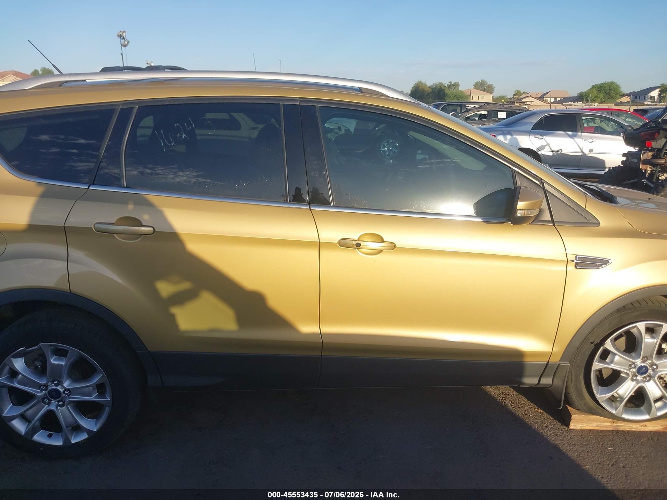 2014 Ford Escape Titanium Gold vin: 1FMCU9J93EUD88100