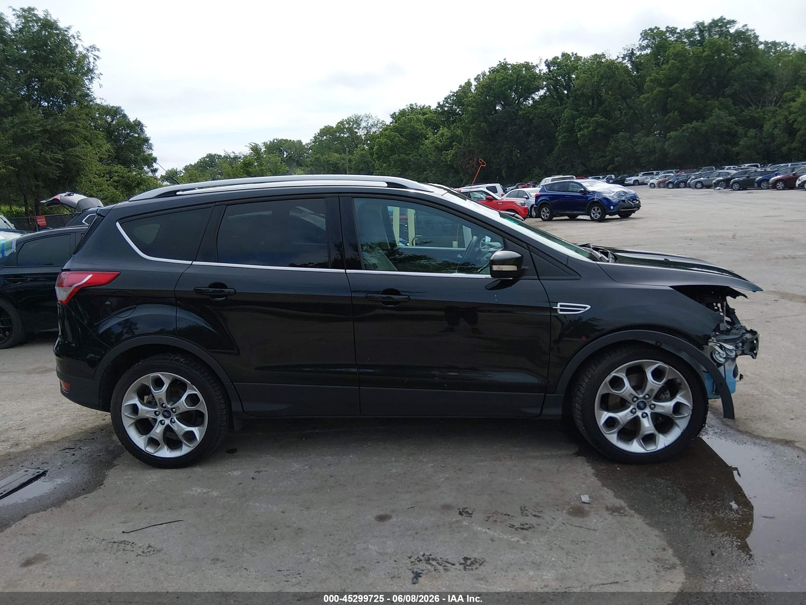 2014 Ford Escape Titanium Black vin: 1FMCU9J94EUB79609