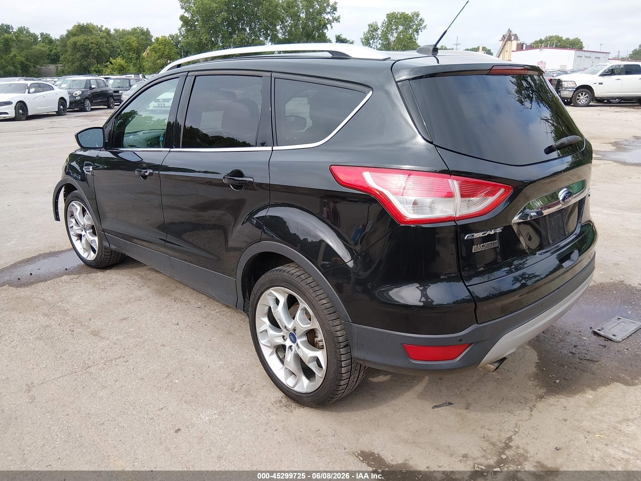 2014 Ford Escape Titanium Black vin: 1FMCU9J94EUB79609