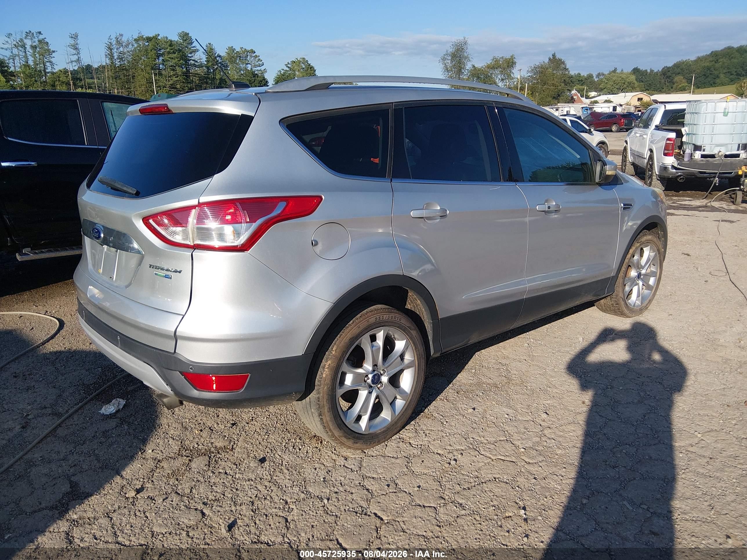 2014 Ford Escape Titanium Серебряный vin: 1FMCU9J94EUC77829