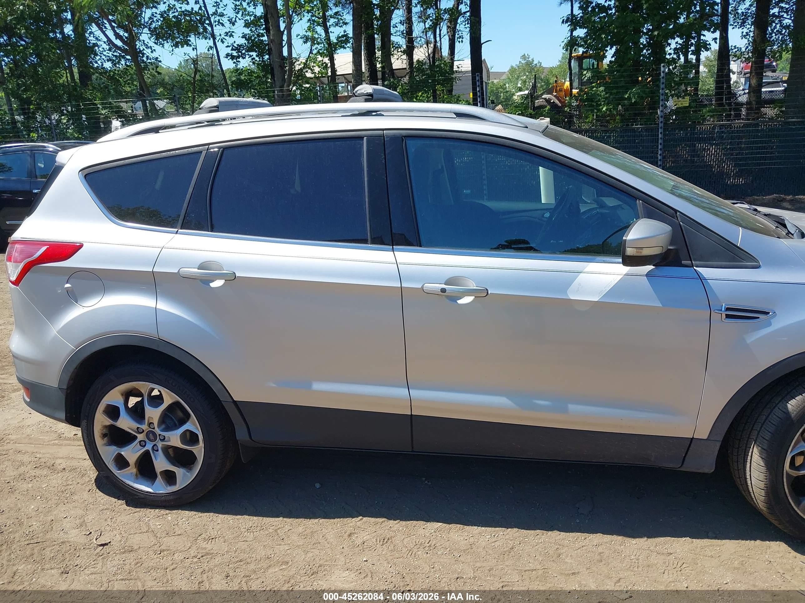 2015 Ford Escape Titanium Серебряный vin: 1FMCU9J95FUB28587