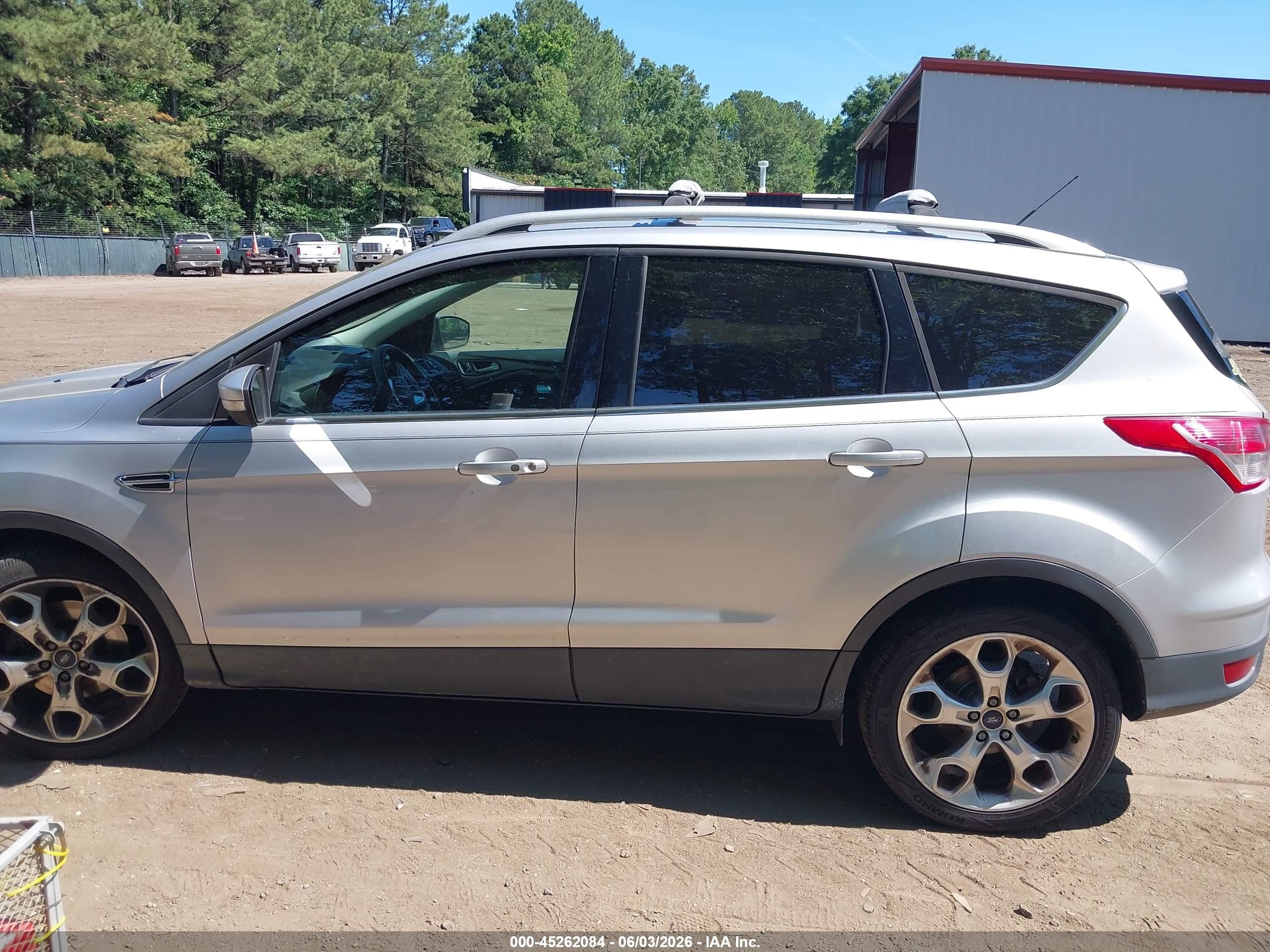 2015 Ford Escape Titanium Серебряный vin: 1FMCU9J95FUB28587