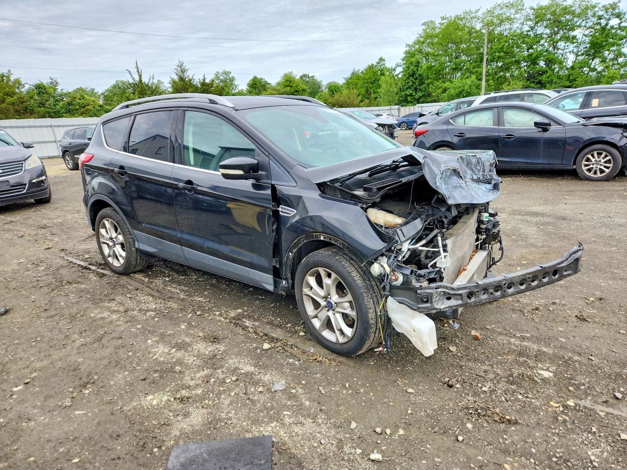 2016 Ford Escape Titanium Black vin: 1FMCU9J95GUB10737