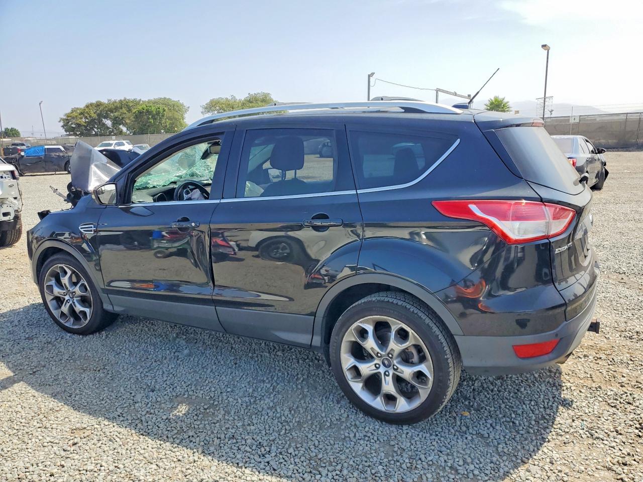 2014 Ford Escape Titanium Black vin: 1FMCU9J96EUA53333