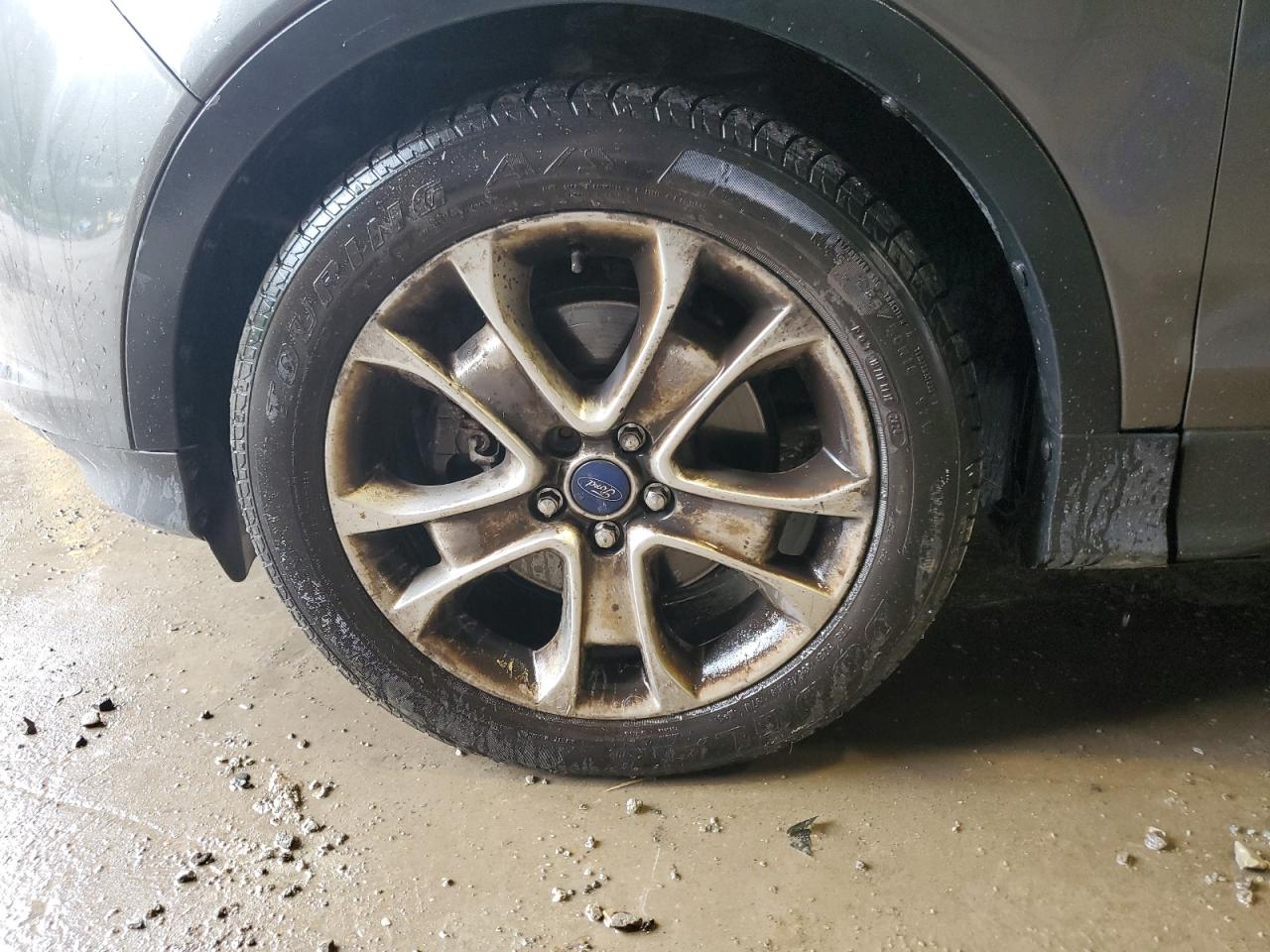 2015 Ford Escape Titanium Gray vin: 1FMCU9J97FUB19339 Damage: Left Front Wheel, Curb Rash, > 12 Inches