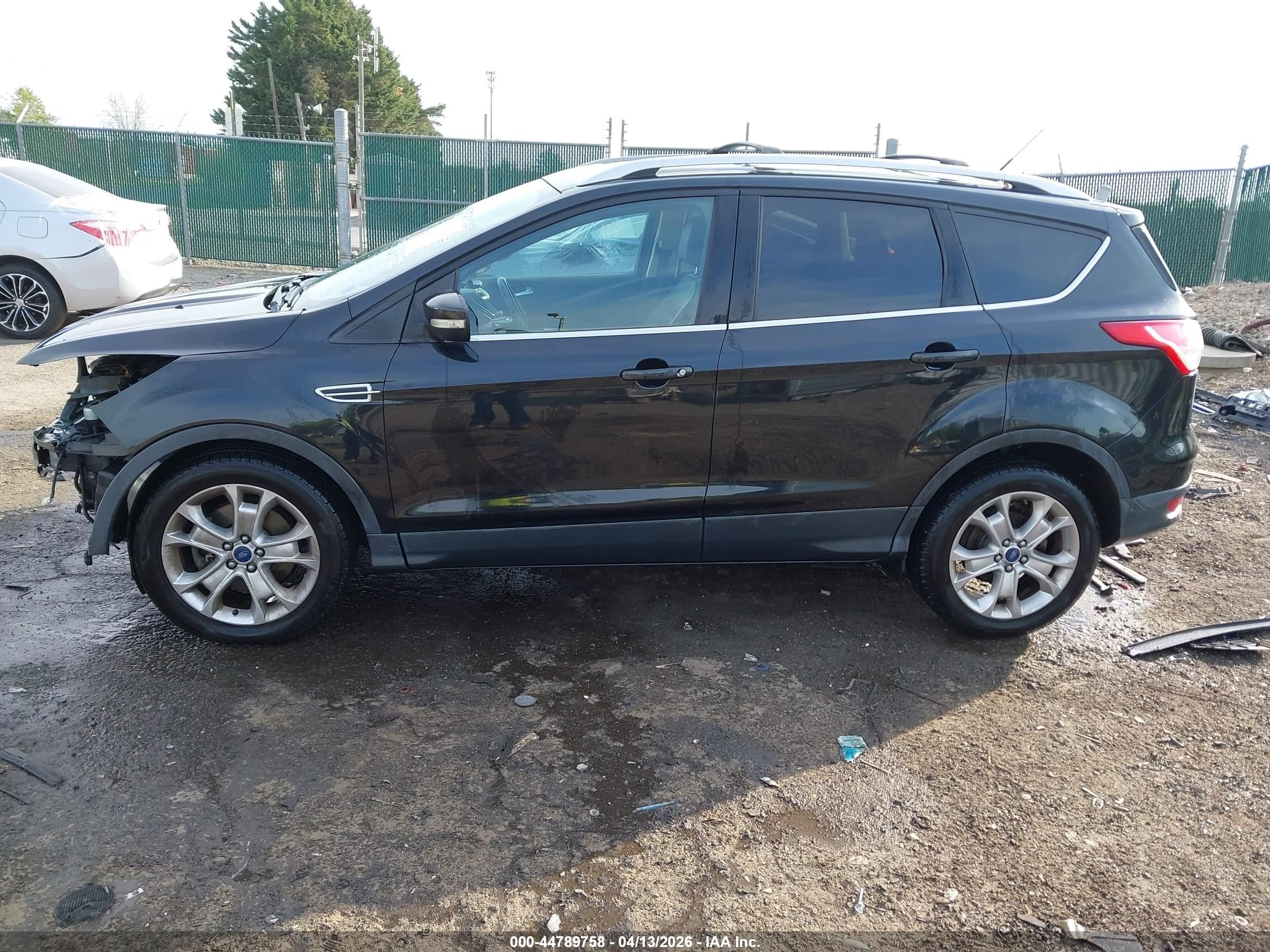 2015 Ford Escape Titanium Black vin: 1FMCU9J98FUB23366
