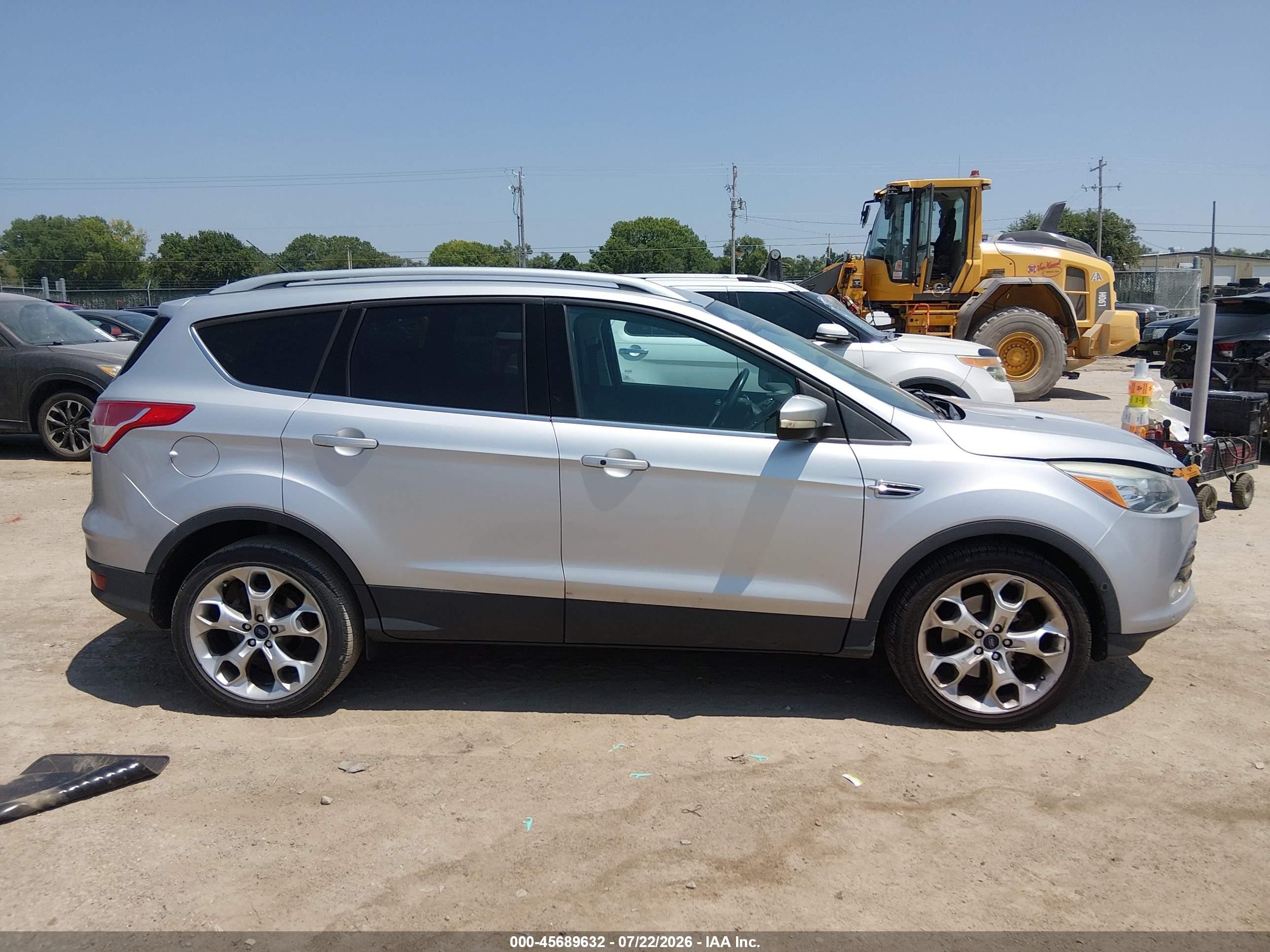 2015 Ford Escape Titanium Серебряный vin: 1FMCU9J98FUB60630