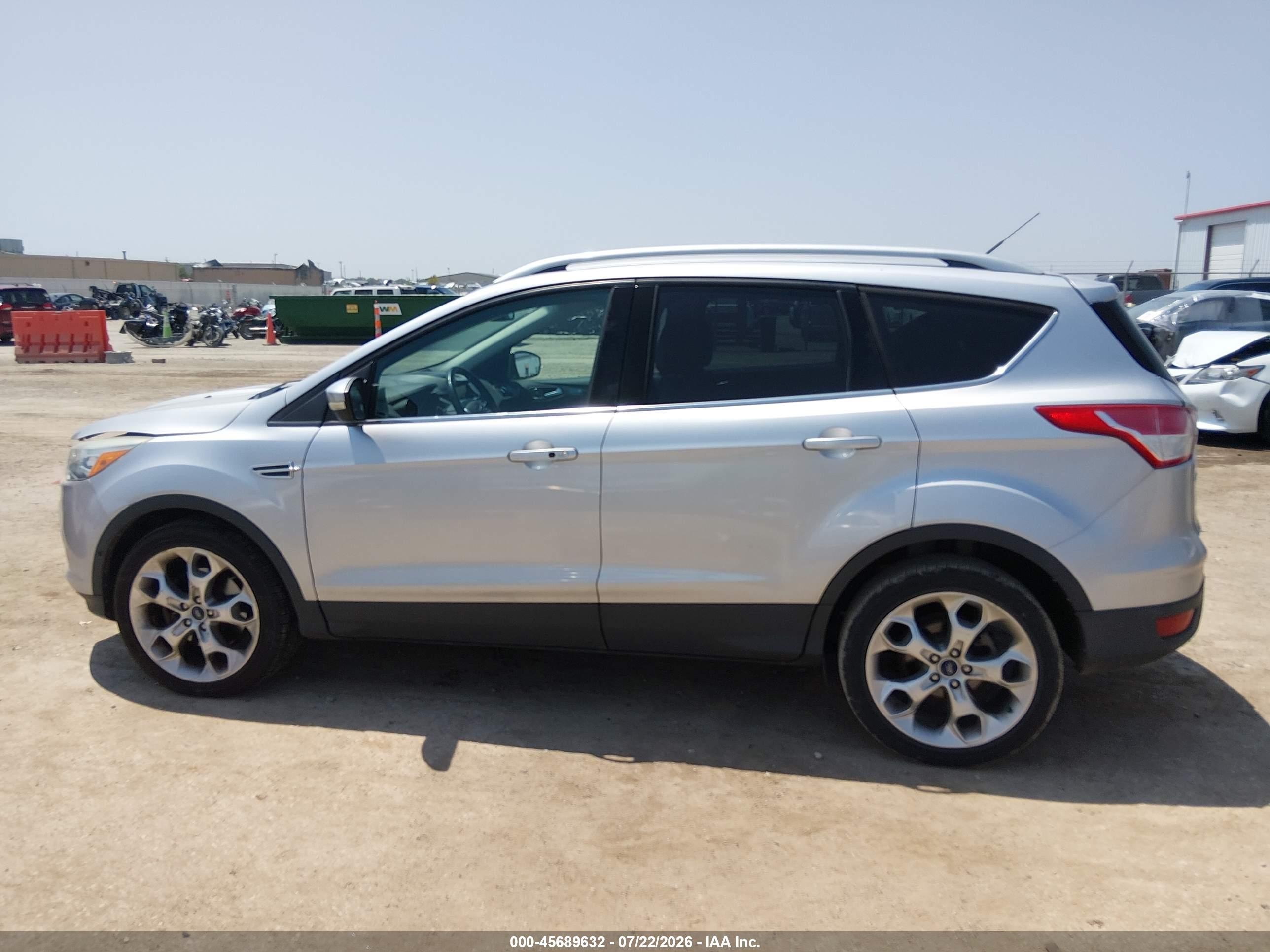 2015 Ford Escape Titanium Серебряный vin: 1FMCU9J98FUB60630