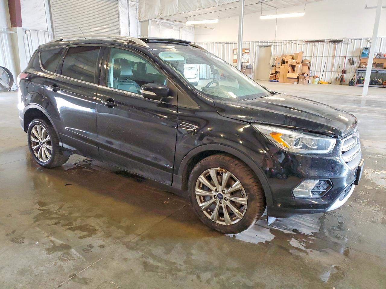 2017 Ford Escape Titanium Черный vin: 1FMCU9J98HUA82188
