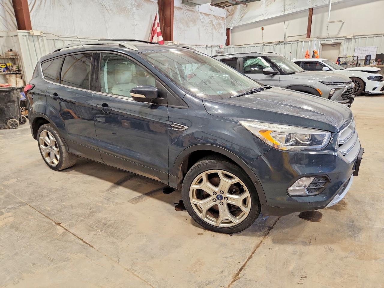 2019 Ford Escape Titanium Blue vin: 1FMCU9J99KUA73488