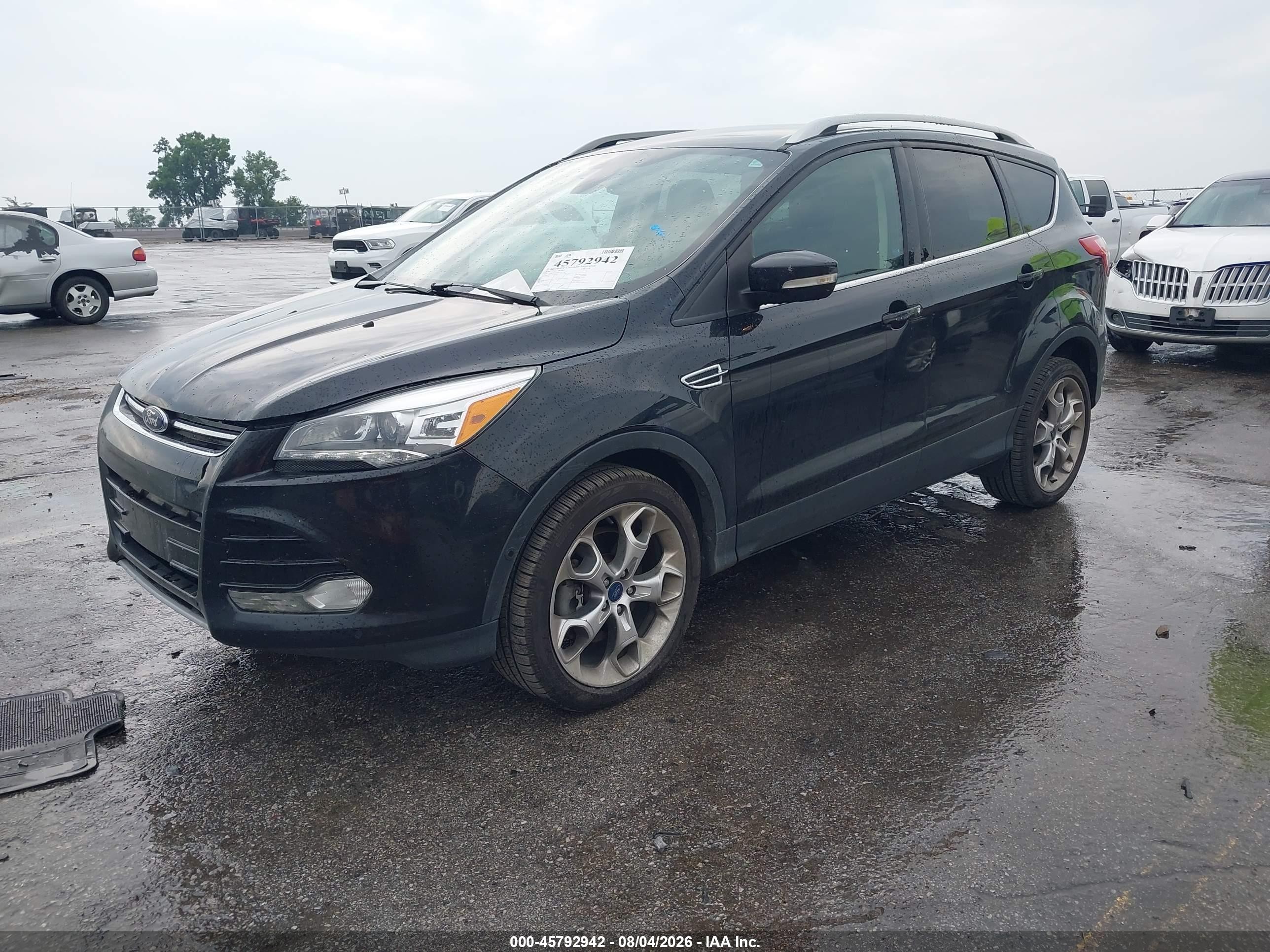 2014 Ford Escape Titanium Black vin: 1FMCU9J9XEUA13367