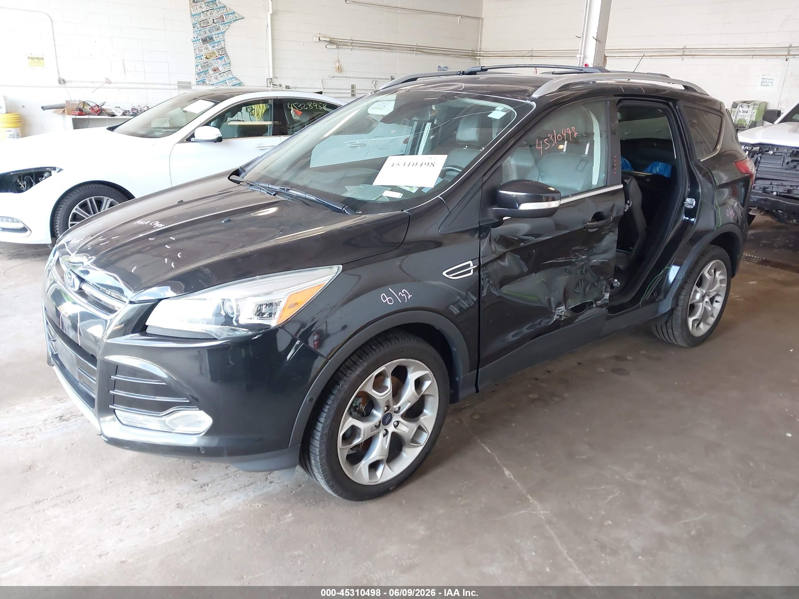 2014 Ford Escape Titanium Black vin: 1FMCU9J9XEUA70782