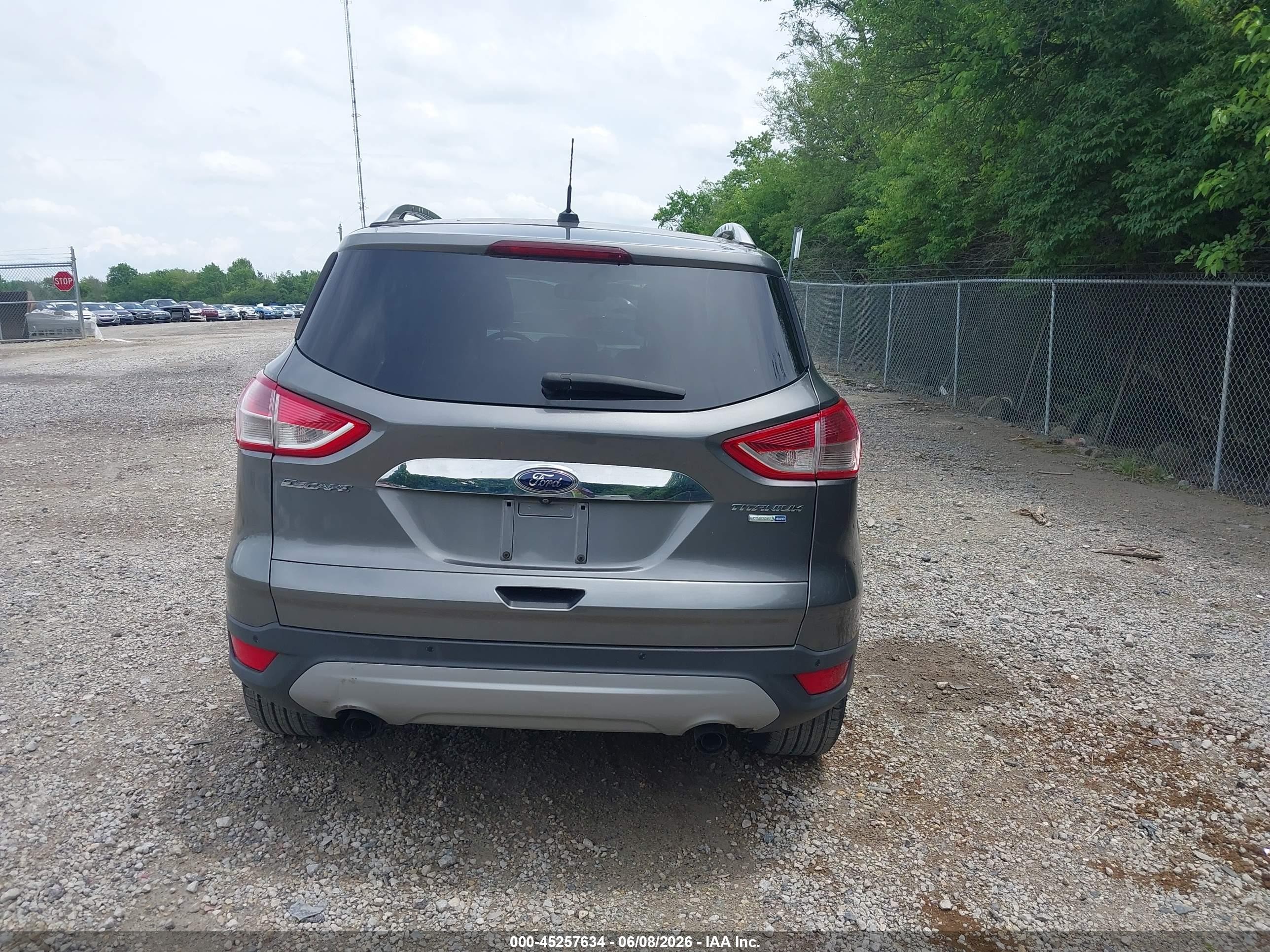 2014 Ford Escape Titanium Black vin: 1FMCU9J9XEUD07528