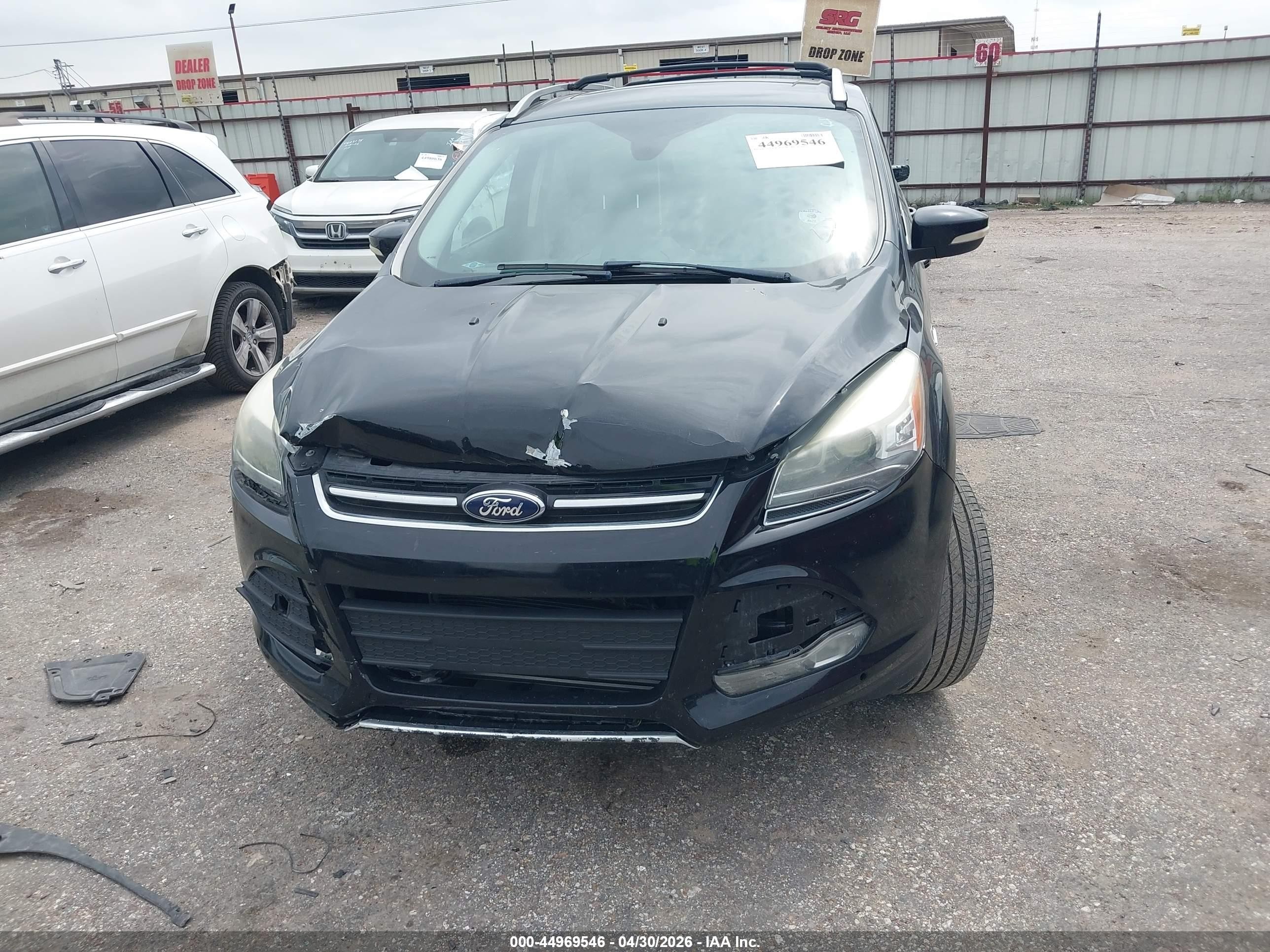 2016 Ford Escape Titanium Черный vin: 1FMCU9J9XGUC80365