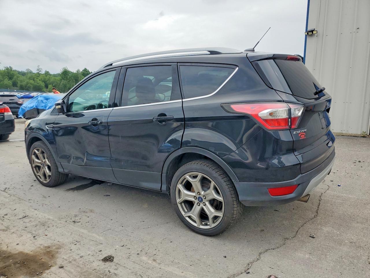 2017 Ford Escape Titanium Black vin: 1FMCU9JD0HUA59136