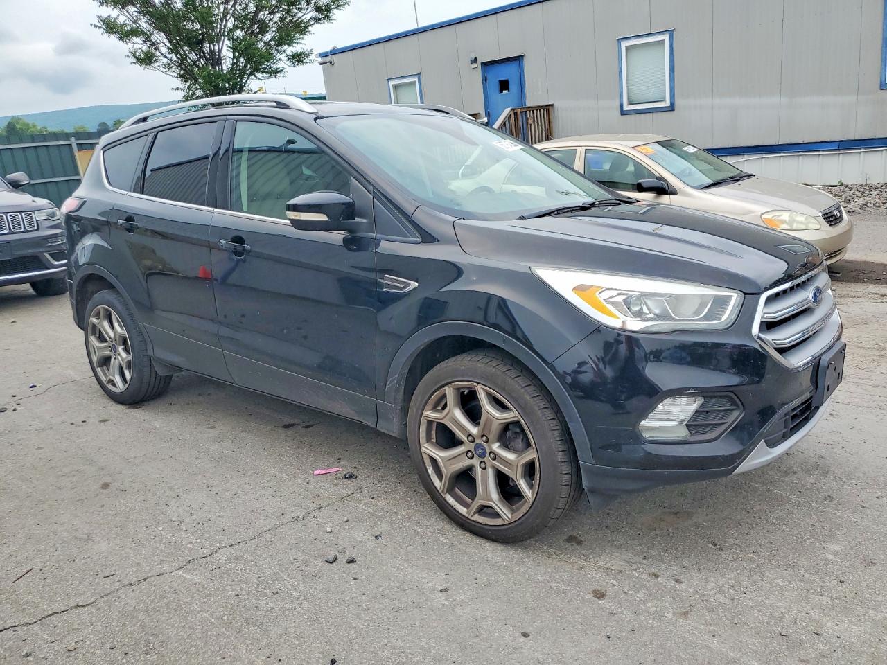 2017 Ford Escape Titanium Black vin: 1FMCU9JD0HUA59136
