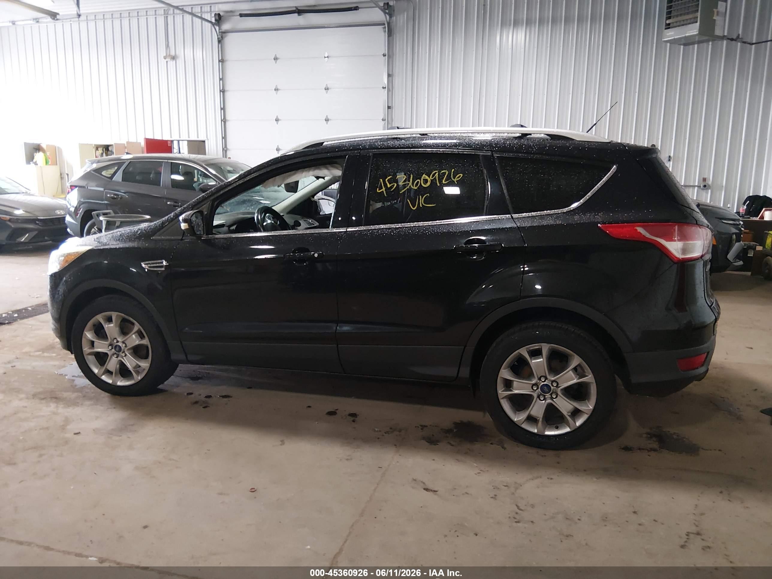 2014 Ford Escape Titanium Black vin: 1FMCU9JX0EUE53189