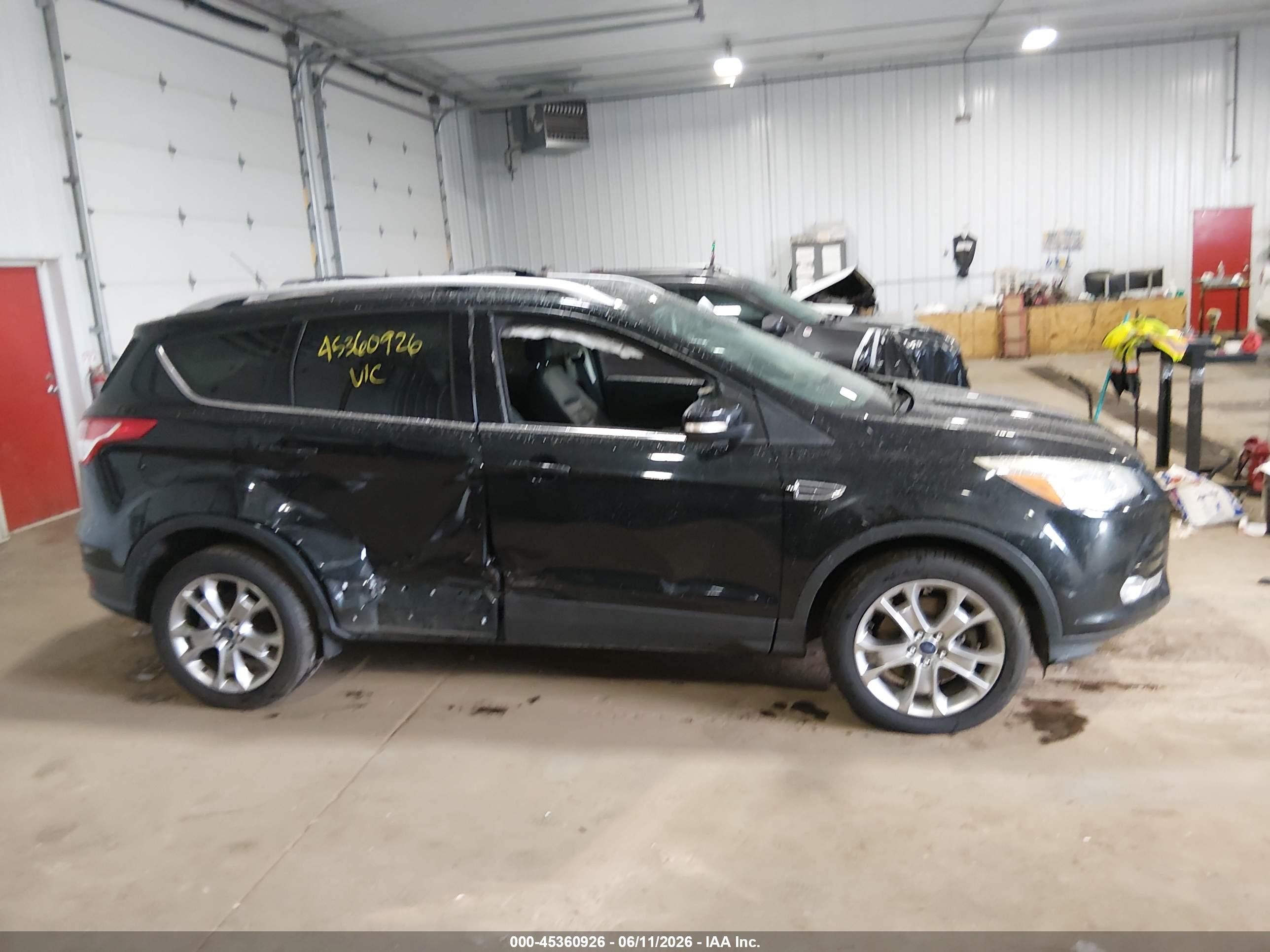 2014 Ford Escape Titanium Black vin: 1FMCU9JX0EUE53189