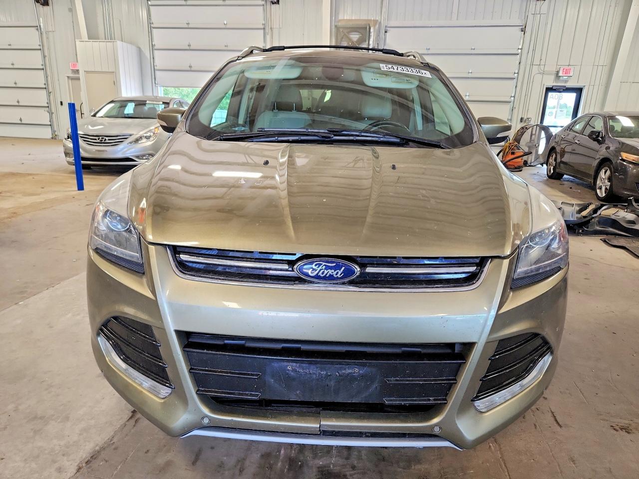 2014 Ford Escape Titanium Tan vin: 1FMCU9JX6EUA13610