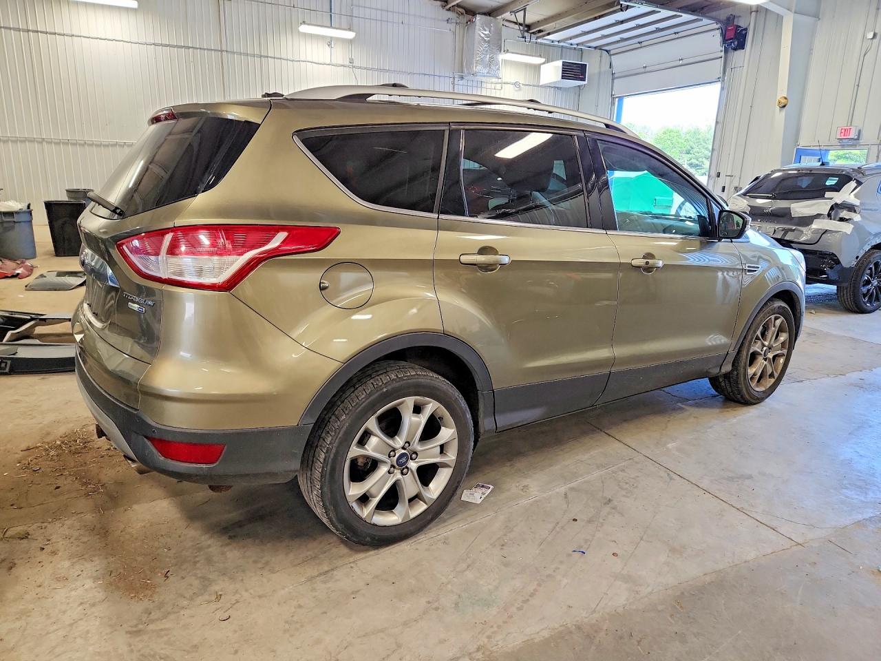 2014 Ford Escape Titanium Tan vin: 1FMCU9JX6EUA13610