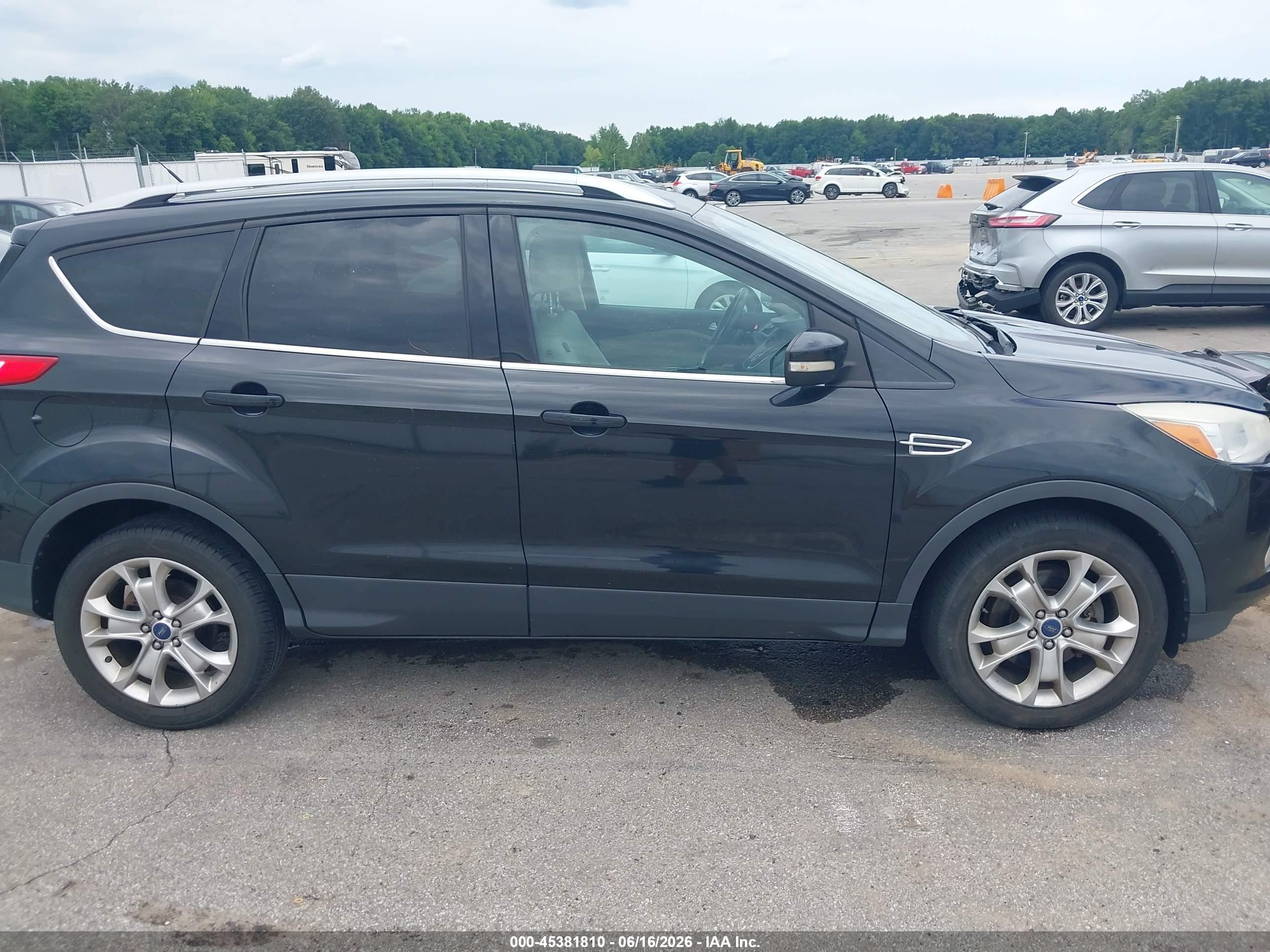 2014 Ford Escape Titanium Black vin: 1FMCU9JX8EUD08370