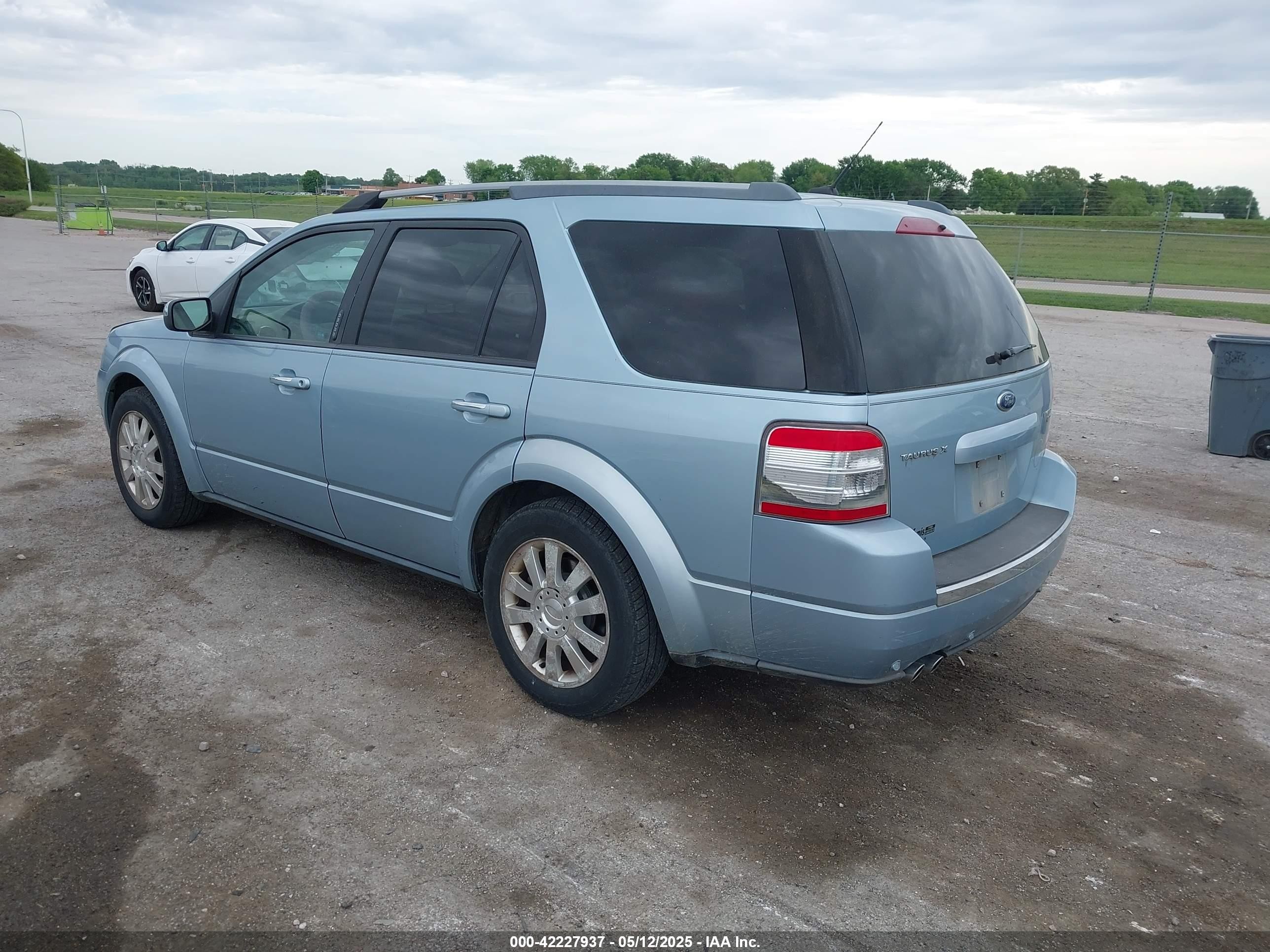 2009 Ford Taurus X Limited Blue vin: 1FMDK06W69GA03959