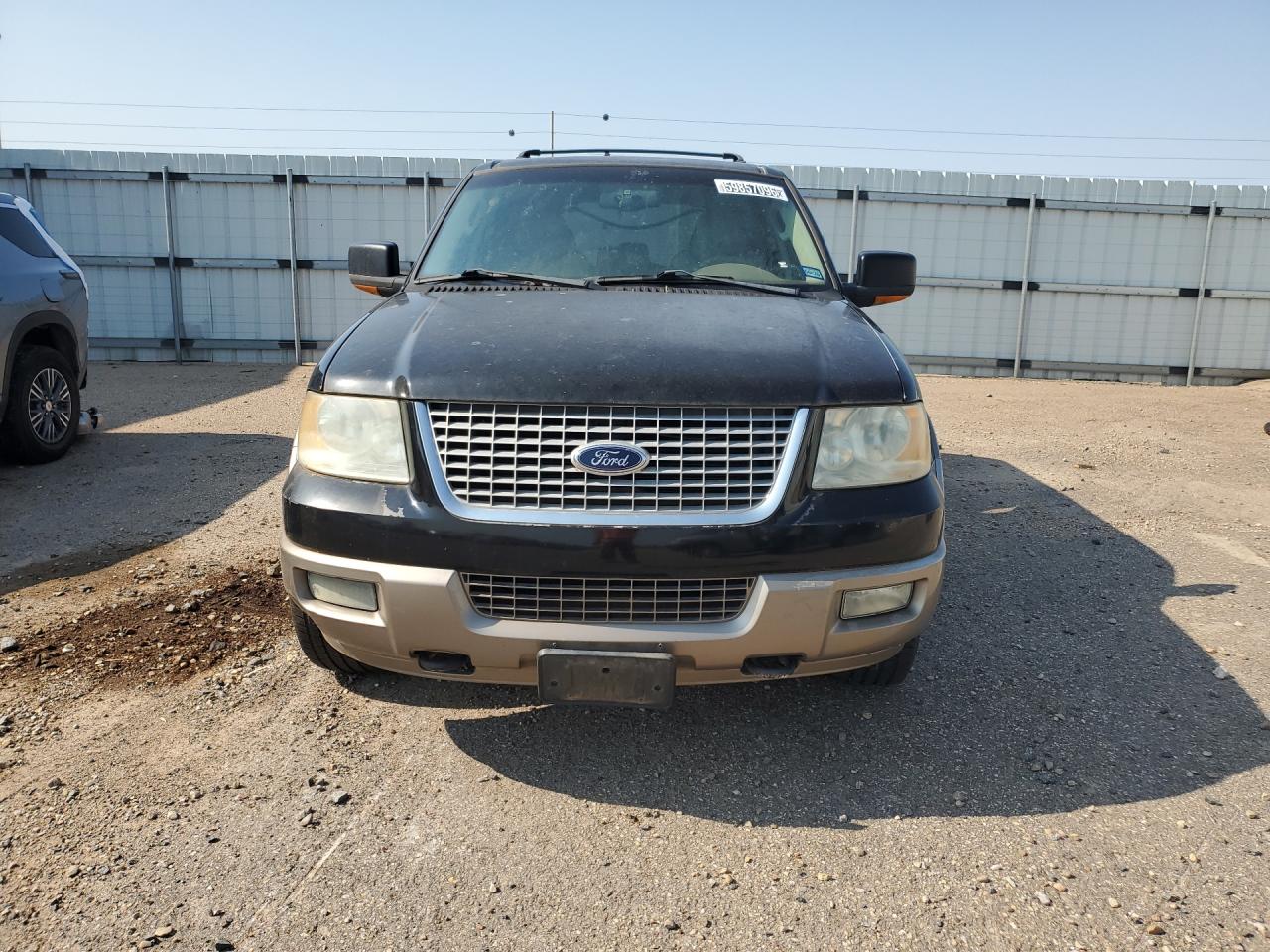 2004 Ford Expedition Eddie Bauer Black vin: 1FMFU18L44LA54839 Damage: Front Bumper Cover Upper, Peeling, > 12 Inches