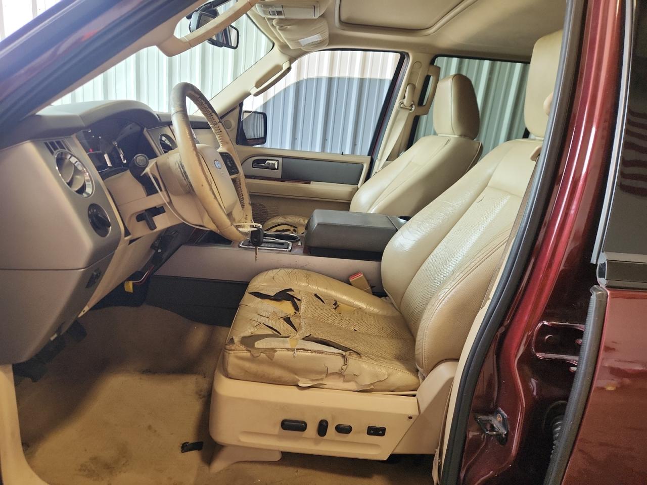 2010 Ford Expedition Eddie Bauer Burgundy vin: 1FMJU1J52AEB03462 Damage: Steering Wheel, Torn, > 12 Inches