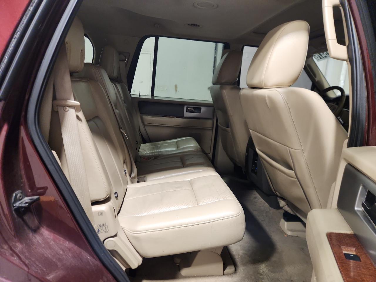 2010 Ford Expedition Eddie Bauer Burgundy vin: 1FMJU1J52AEB03462 Damage: Left Front Seat Back, Torn, 2 To 3 Inches