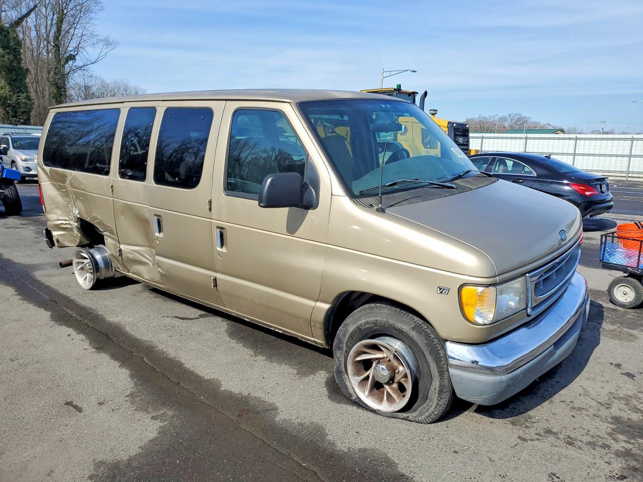 1999 Ford Econoline E150 Wagon Tan vin: 1FMRE11L4XHA55274