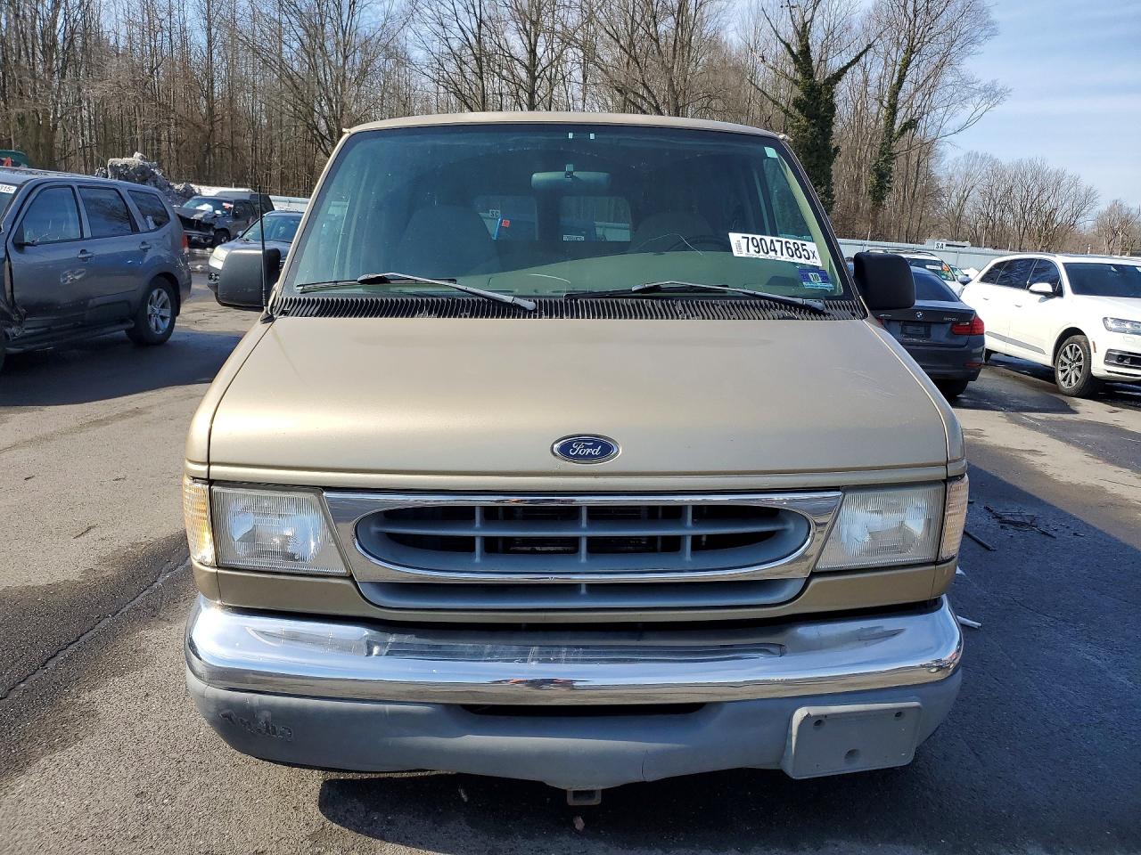 1999 Ford Econoline E150 Wagon Tan vin: 1FMRE11L4XHA55274