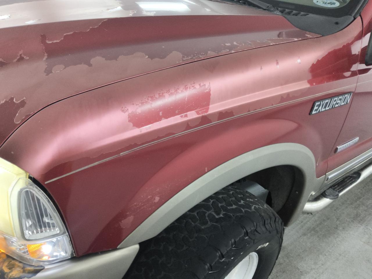 2003 Ford Excursion Eddie Bauer Brown vin: 1FMSU45P93EC17687 Damage: Left Front Fender, Peeling, > 12 Inches