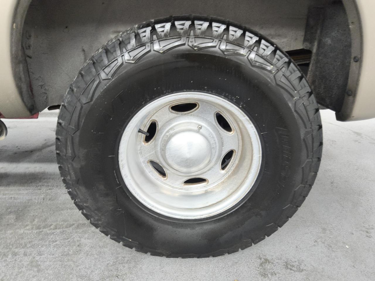2003 Ford Excursion Eddie Bauer Brown vin: 1FMSU45P93EC17687 Damage: Left Rear Wheel, Aftermarket, Acceptable
