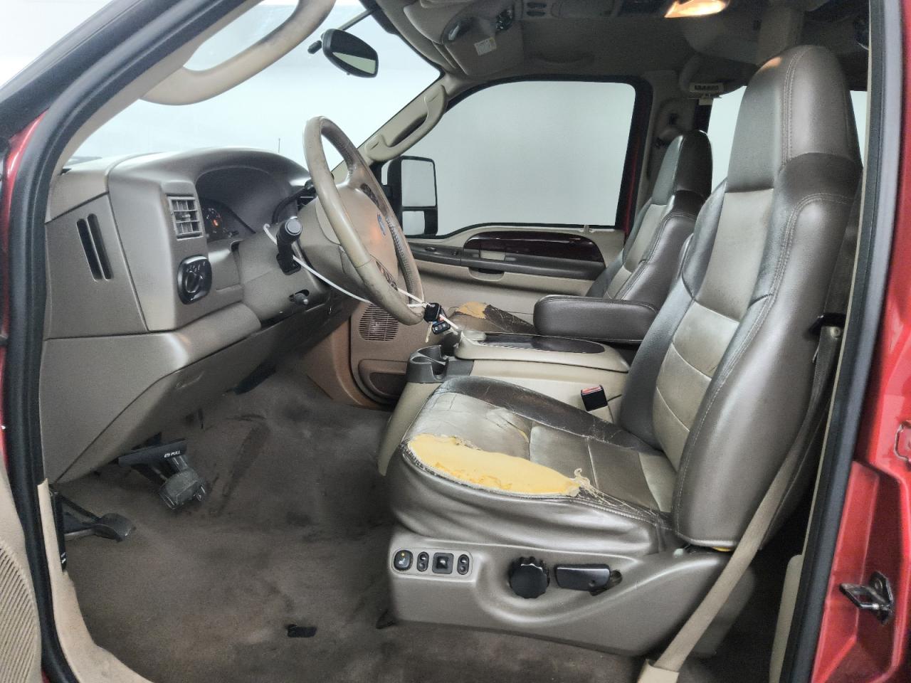 2003 Ford Excursion Eddie Bauer Brown vin: 1FMSU45P93EC17687 Damage: Right Front Seat Cushion, Torn, 3 To 4 Inches