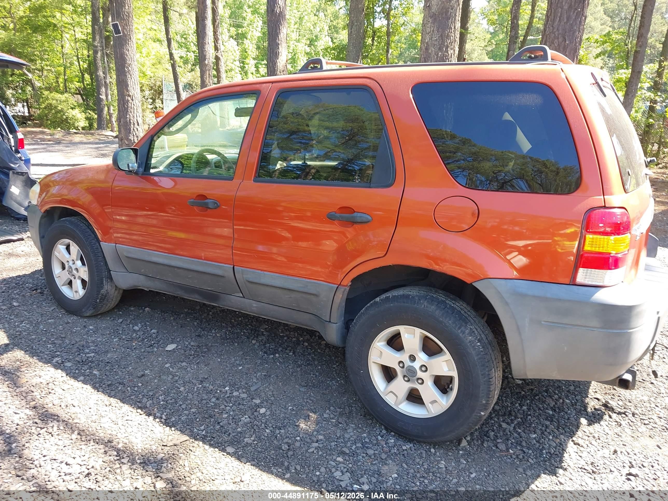 2006 Ford Escape   Orange vin: 1FMYU931X6KA11693