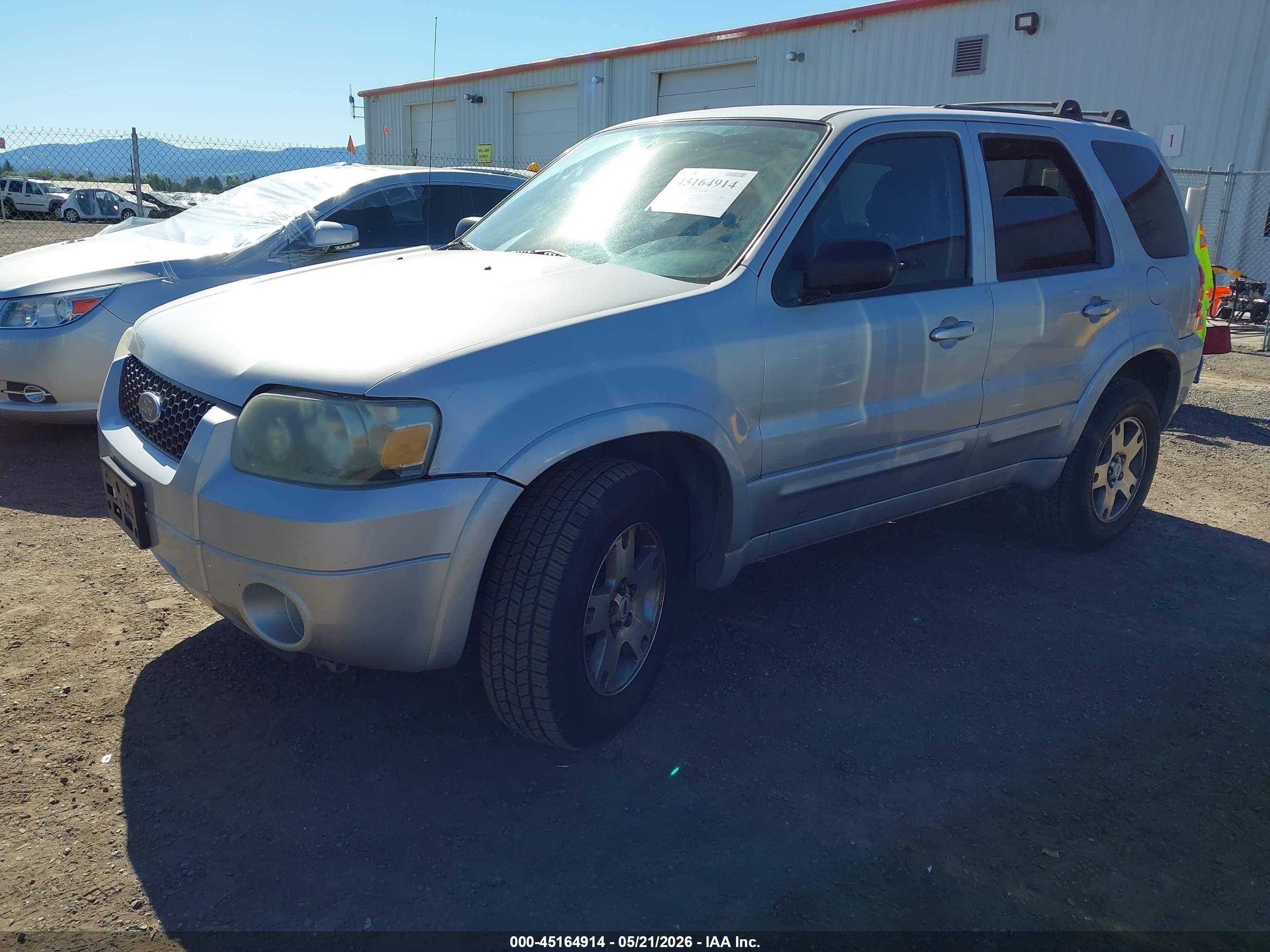 2005 Ford Escape Limited Серебряный vin: 1FMYU94175KA63635