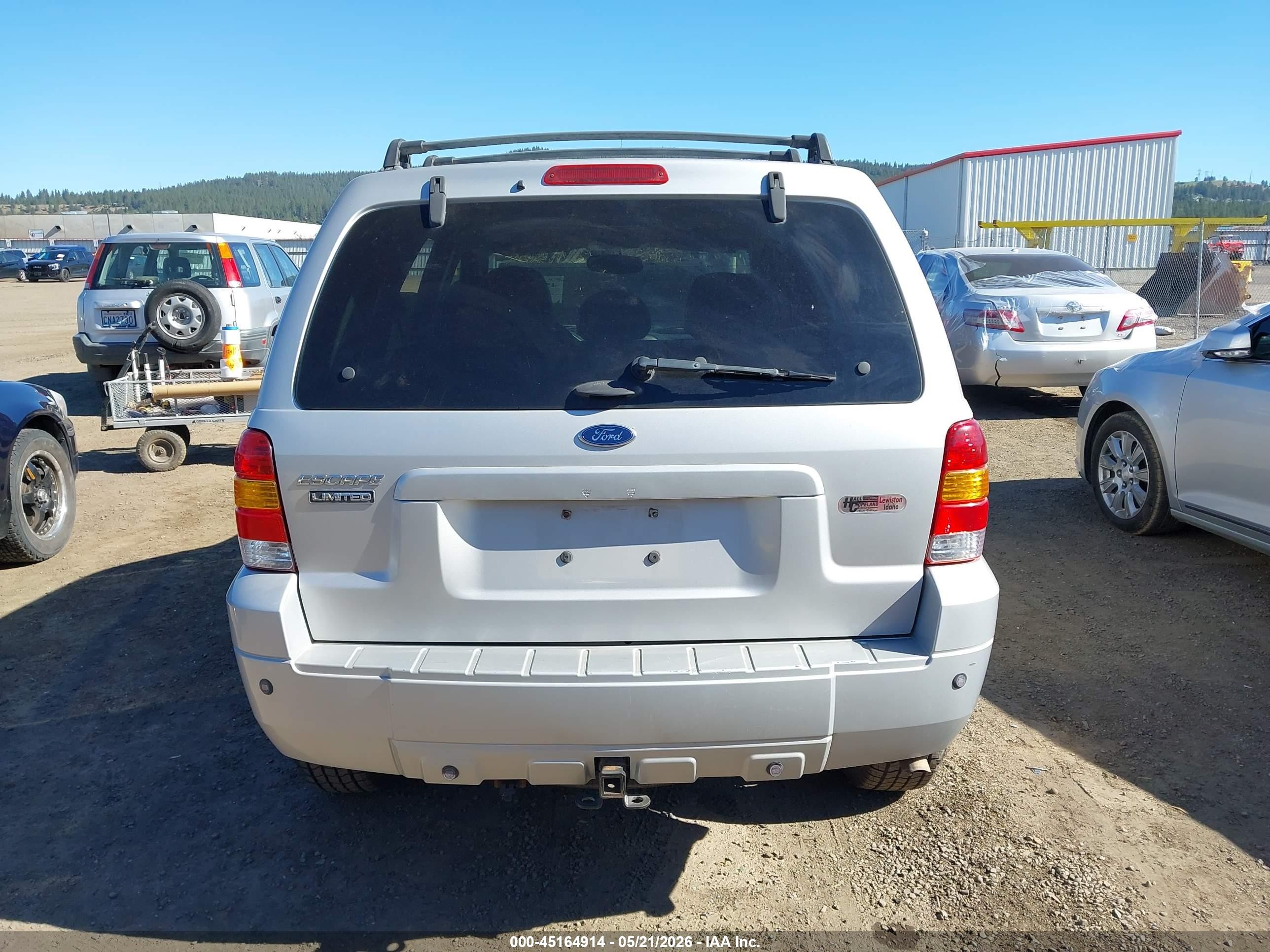 2005 Ford Escape Limited Серебряный vin: 1FMYU94175KA63635