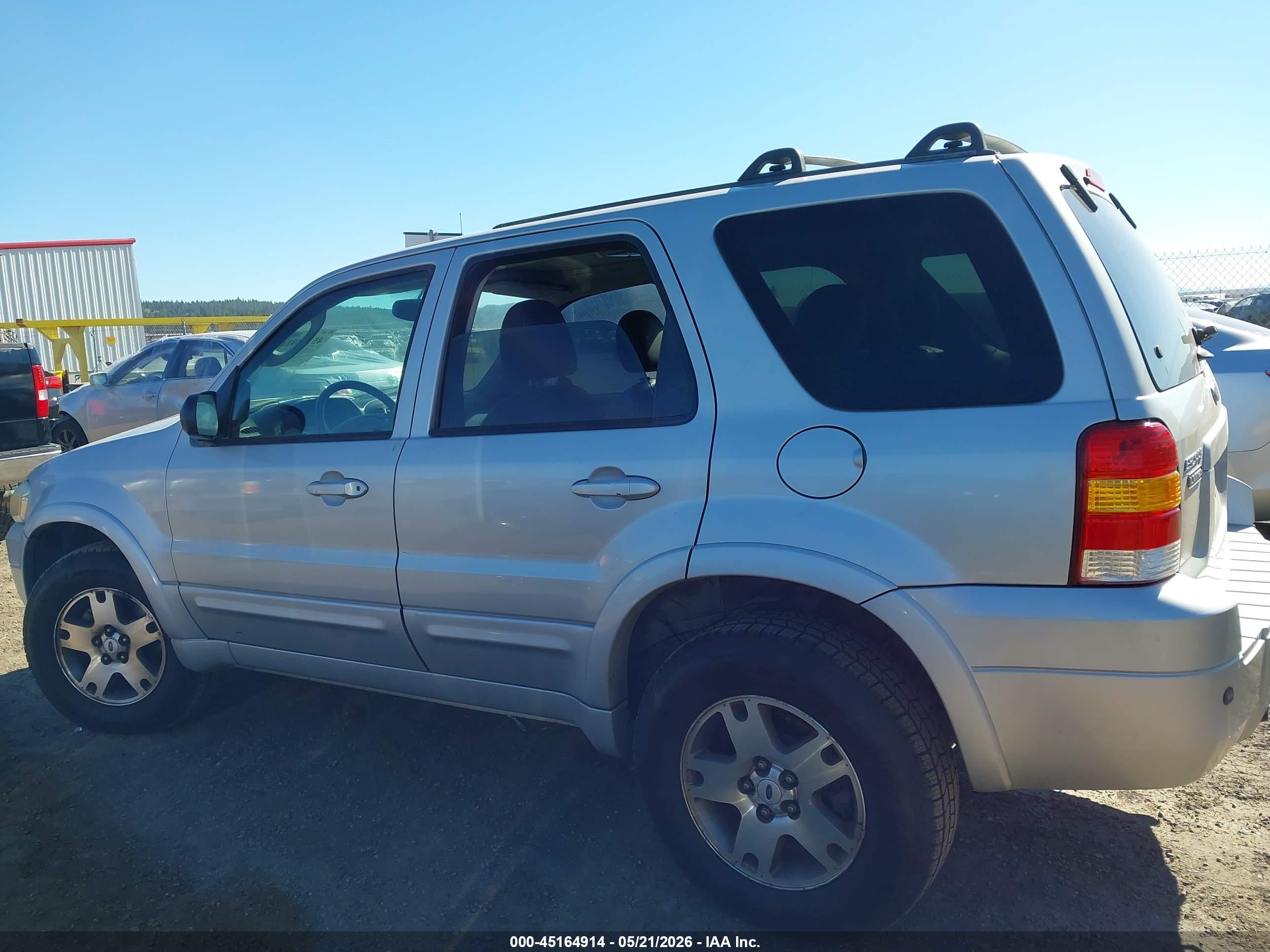 2005 Ford Escape Limited Серебряный vin: 1FMYU94175KA63635