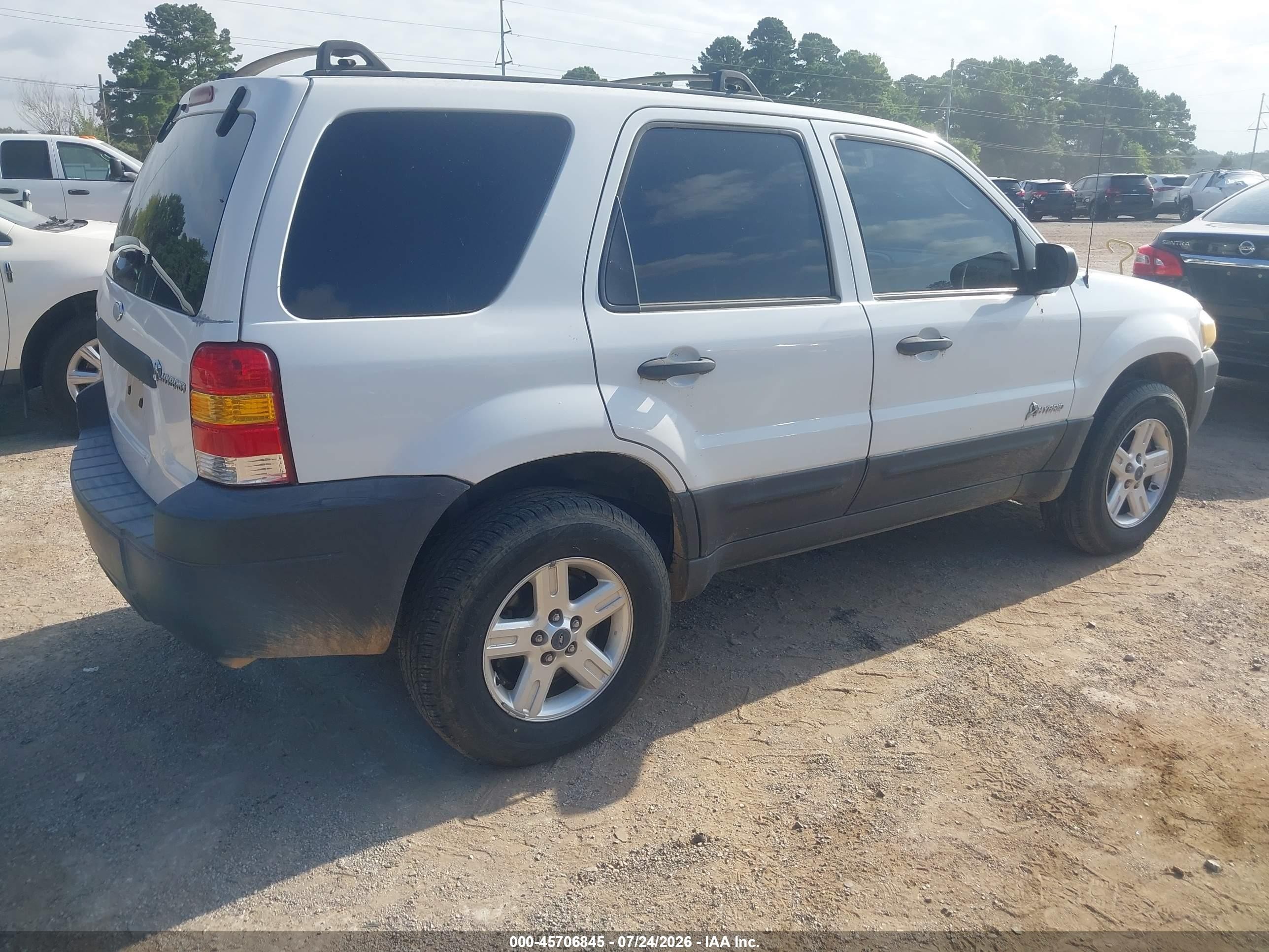 2006 Ford Escape Hybrid   White vin: 1FMYU95H06KC73538
