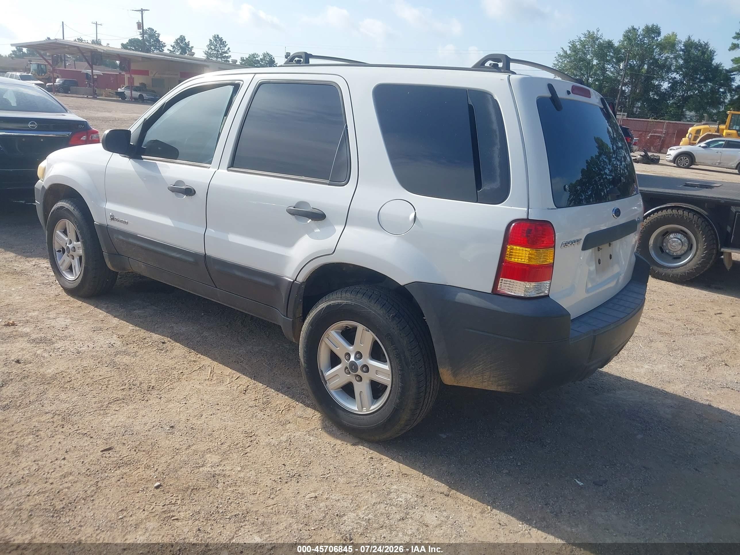 2006 Ford Escape Hybrid   White vin: 1FMYU95H06KC73538