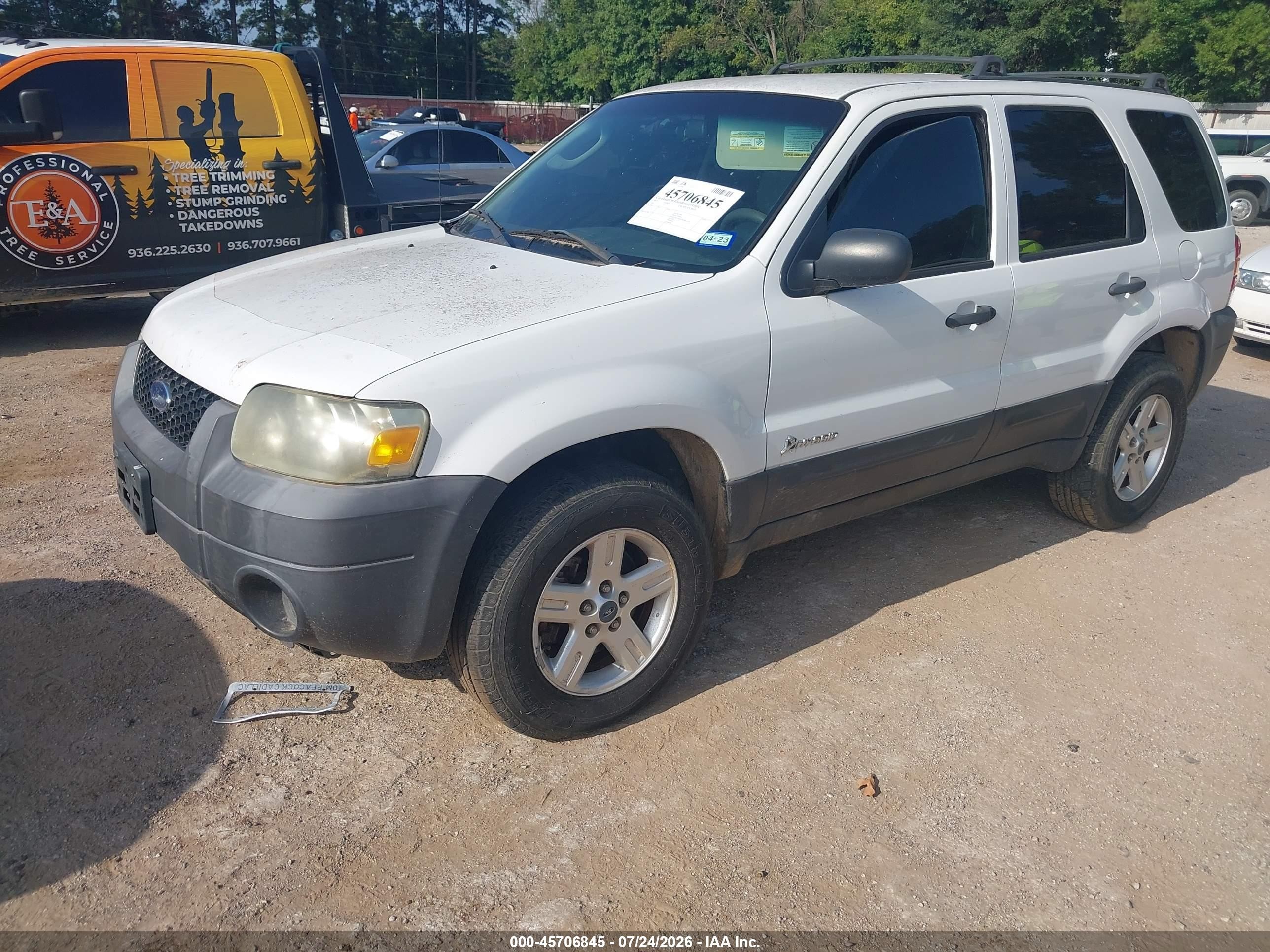 2006 Ford Escape Hybrid   White vin: 1FMYU95H06KC73538