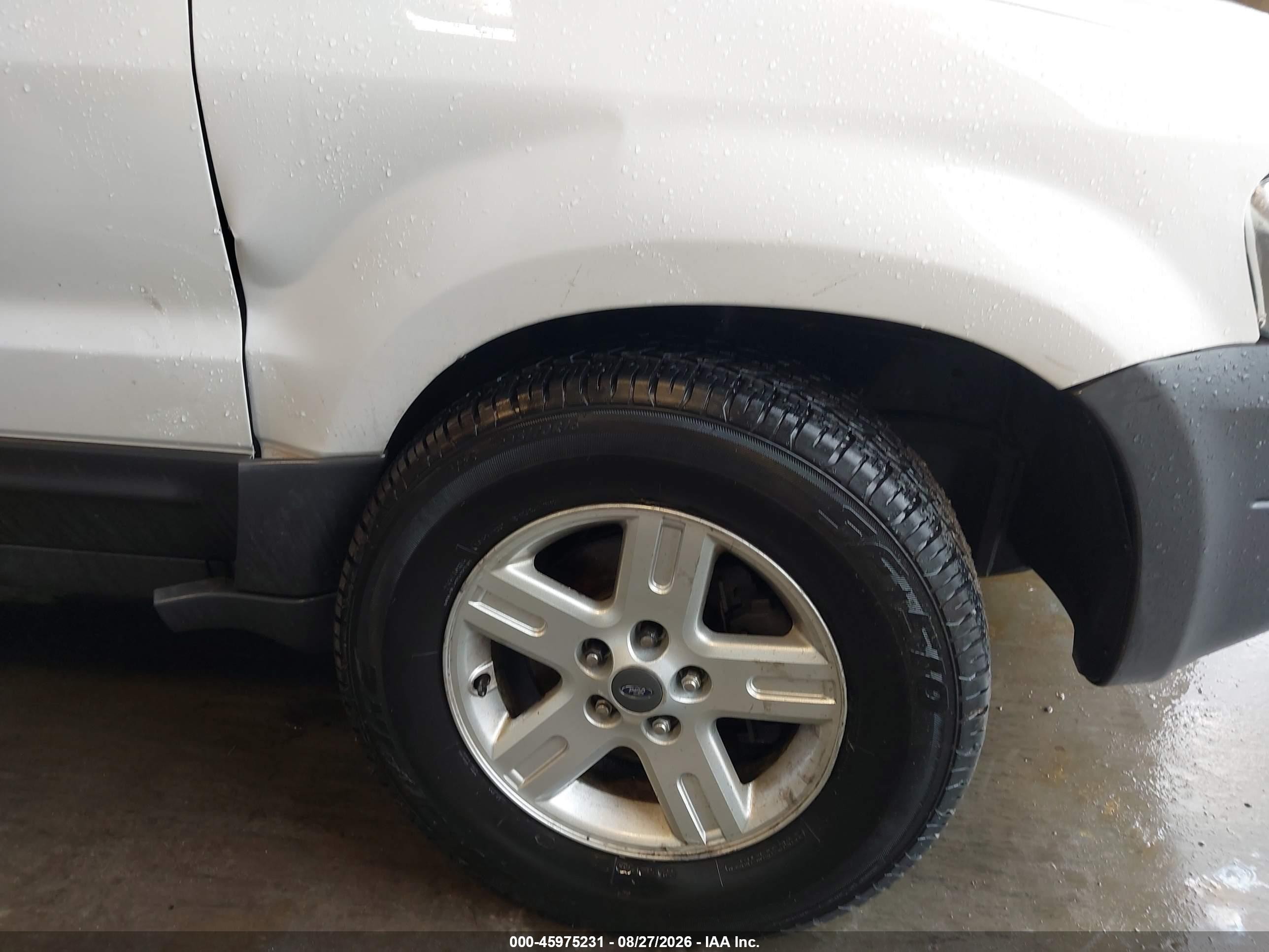 2006 Ford Escape Hybrid   White vin: 1FMYU96HX6KC63663
