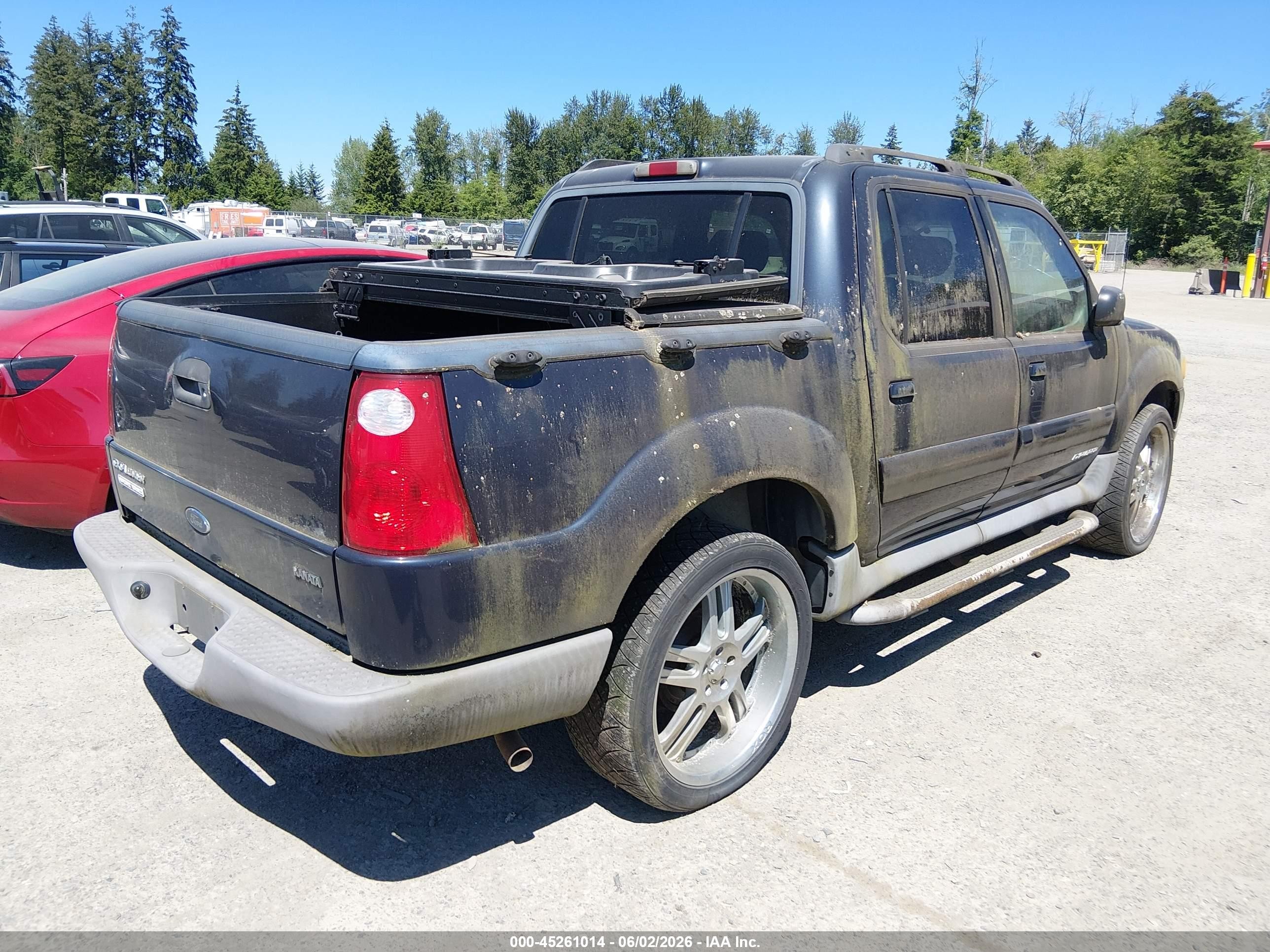 2001 Ford Explorer Sport Trac   Black vin: 1FMZU77E11UA36971