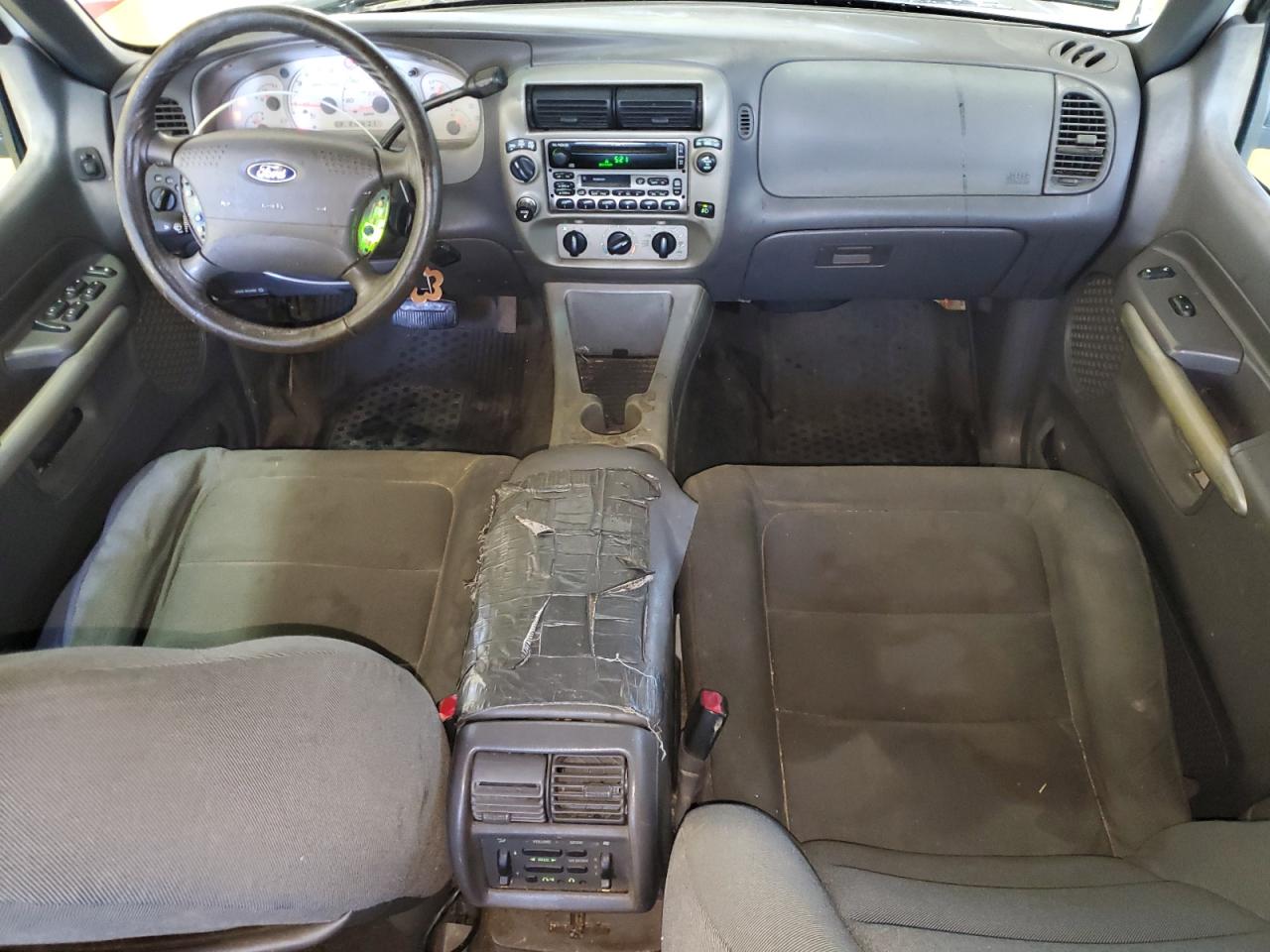 2001 Ford Explorer Sport Trac White vin: 1FMZU77E81UB57237 Damage: Front Center Armrest, Worn, Replacement Required