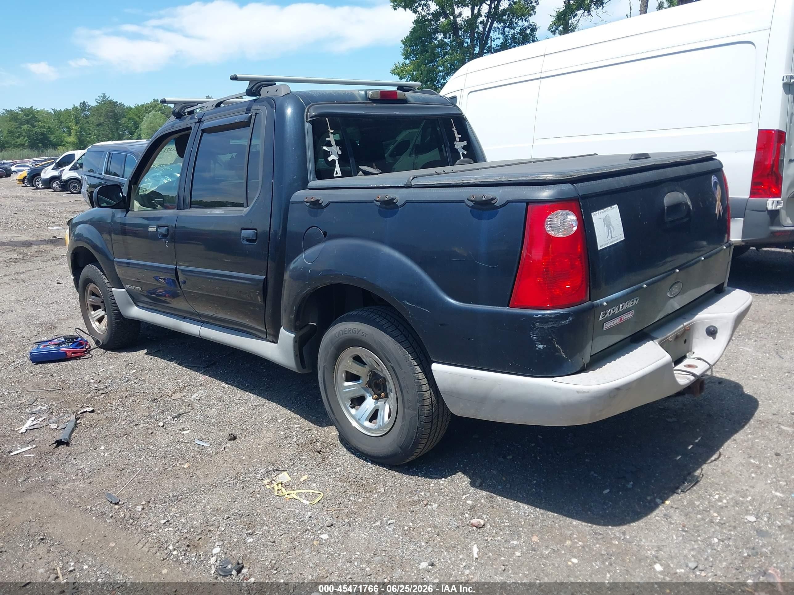 2001 Ford Explorer Sport Trac   Black vin: 1FMZU77E91UB06331