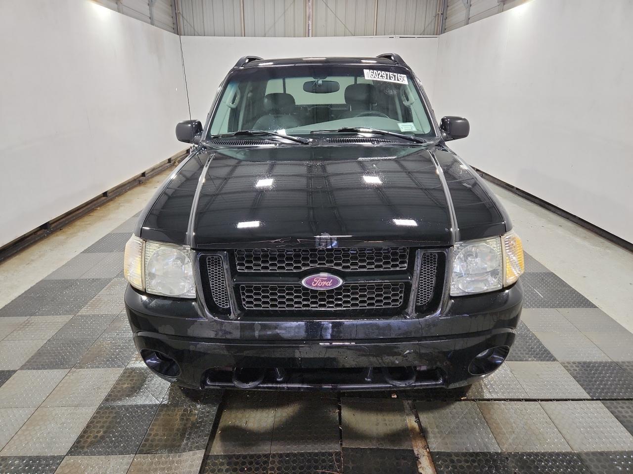 2004 Ford Explorer Sport Trac Black vin: 1FMZU77K34UB10272 Damage: Right Head Lamp, Faded, Acceptable
