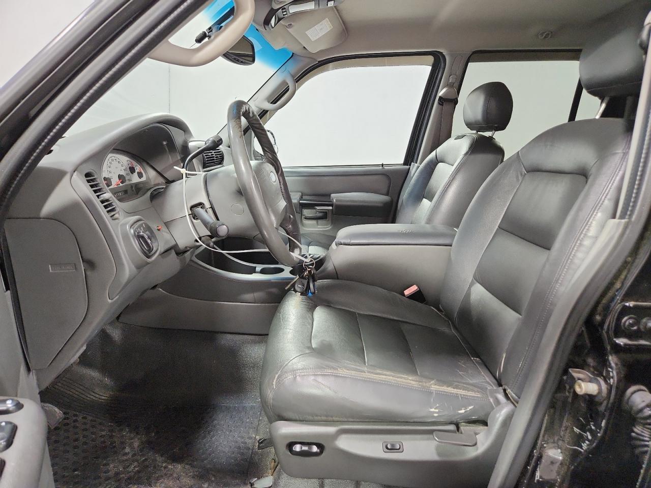 2004 Ford Explorer Sport Trac Black vin: 1FMZU77K34UB10272 Damage: Steering Wheel, Worn, Acceptable