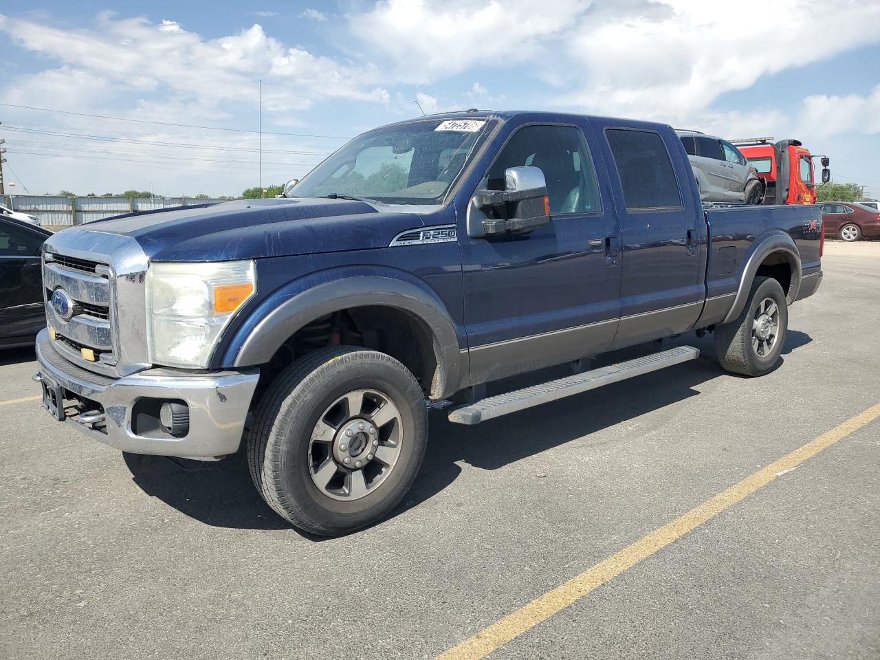 2011 Ford F250 Super Duty Blue vin: 1FT7W2B64BED02925 Damage: Left Front Fender, Multiple Scratches Light, 4